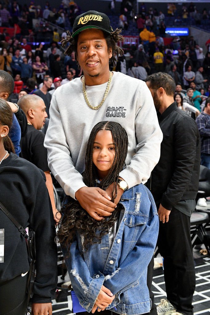Jay-Z and his daughter, Blue Ivy pose for a photo after the game between the Lakers and the Clippers on March 8, 2020. | Photo: Getty Images 