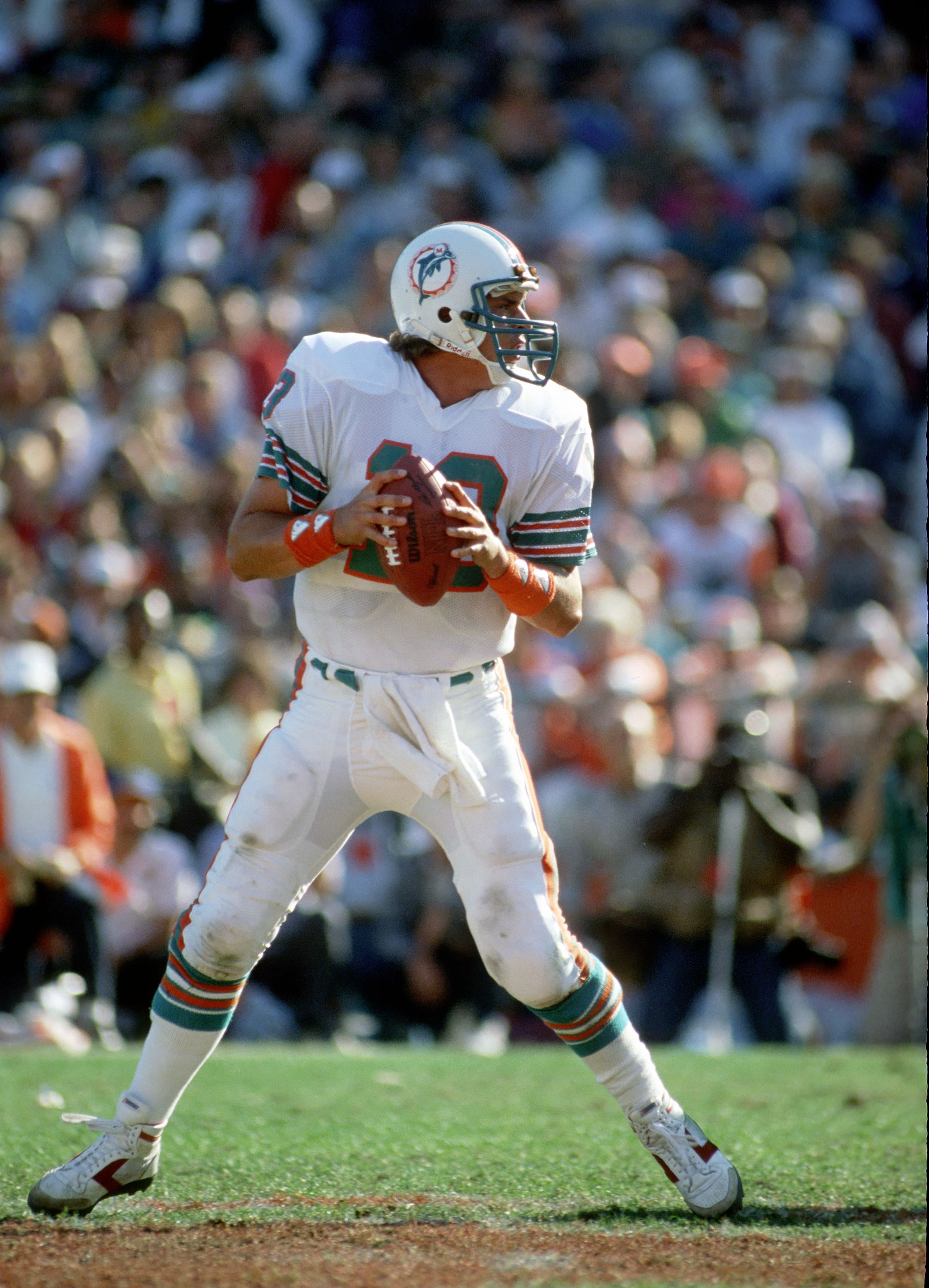 Dan Marino #13 of the Miami Dolphins looks to pass during the 1984 season AFC Championship game against the Pittsburgh Steelers at the Orange Bowl on January 6, 1985 in Miami, Florida. | Source: Getty Images