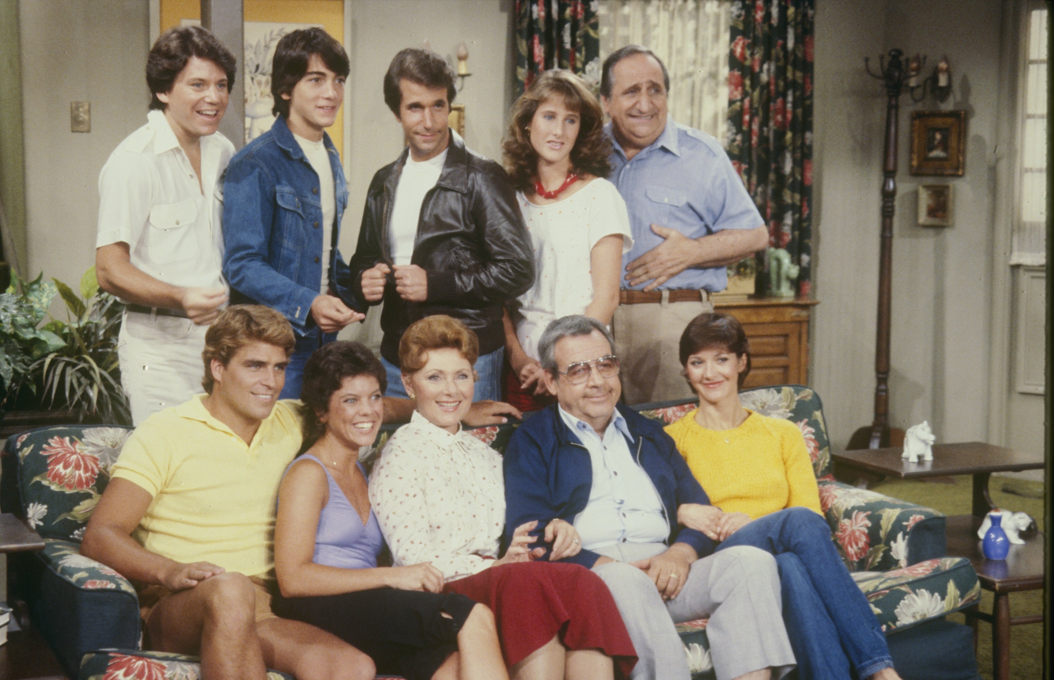 The "Happy Days" cast members Anson Williams, Scott Baio, Henry Winkler, Cathy Silvers, Al Molinaro,(Top, L-R) Ted McGinley, Erin Moran, Marion Ross, Tom Bosley, and Lynda Goodfriend (Bottom, L-R) | Source: Getty Images