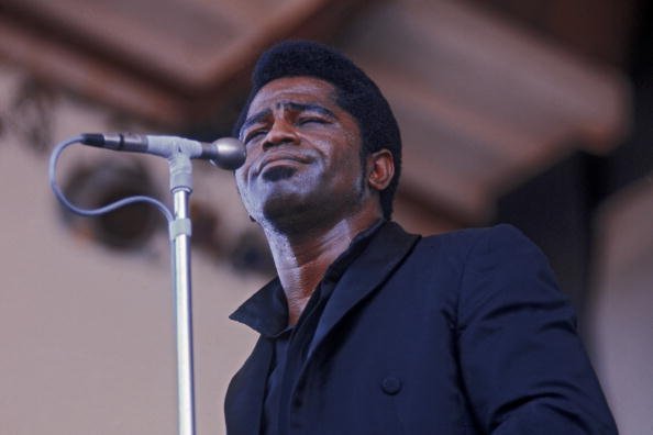 Late American singer, and songwriter James Brown performing at the Newport Jazz Festival in 1968. | Photo: Getty Images