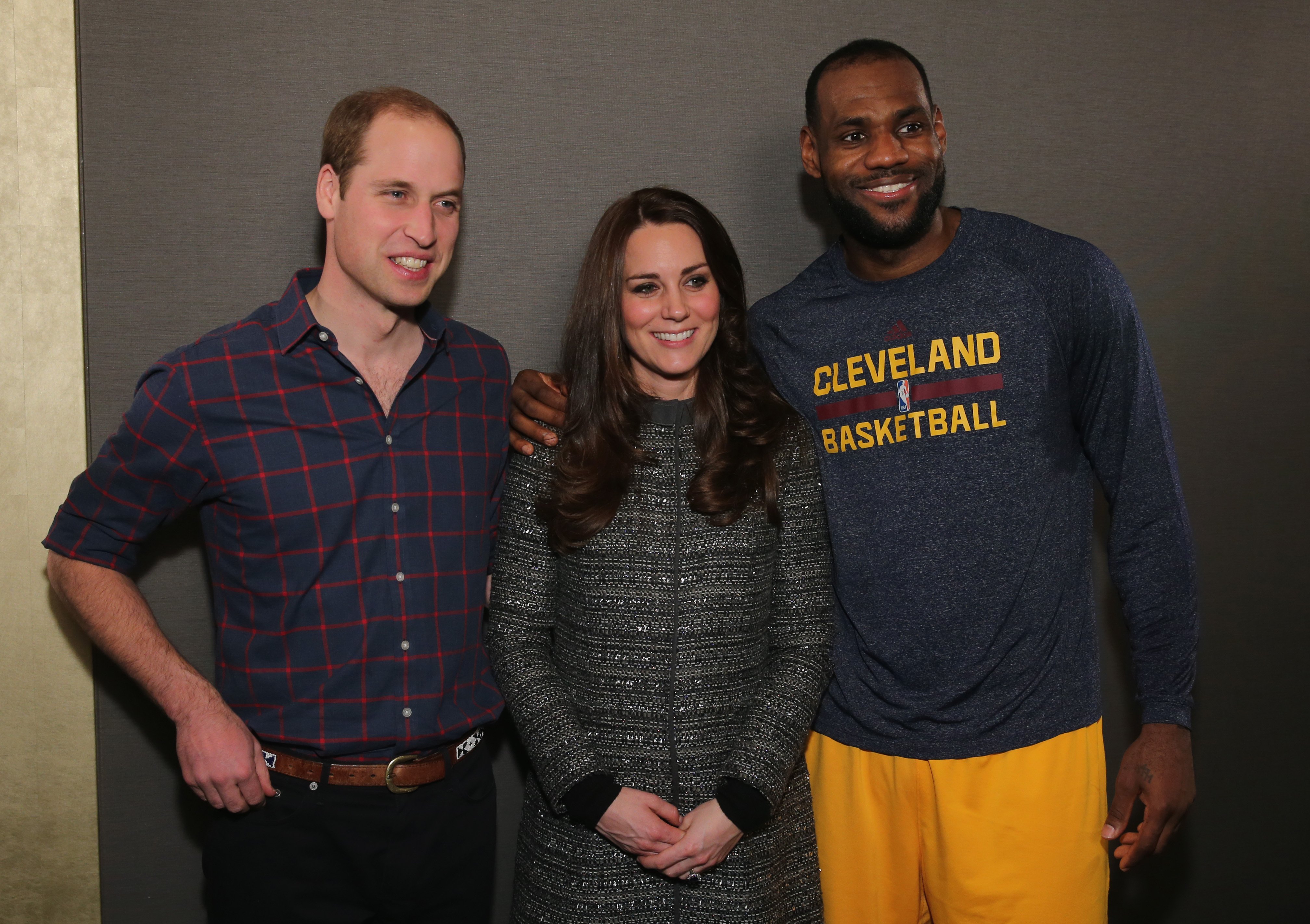 Prince William and Kate Middleton posing with basketball player LeBron James backstage as they attend the Cleveland Cavaliers vs. Brooklyn Nets game at Barclays Center on December 8, 2014 in the Brooklyn borough of New York City ┃Source: Getty Images