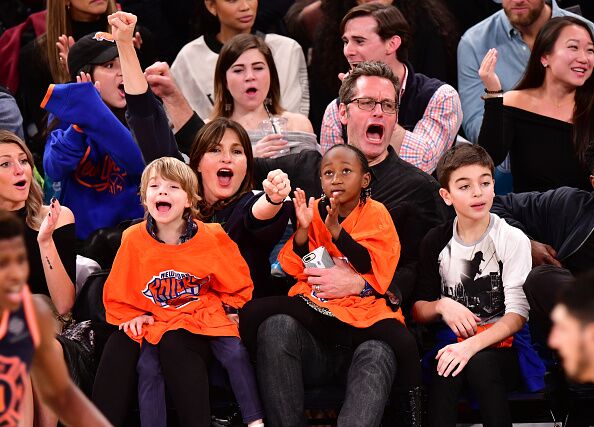 Mariska Hargitay and Peter Hermann sit courtside with children Amaya Hermann, Andrew Hermann and August Hermann at the New York Knicks vs Boston Celtics game  | Getty Images / Global Images Urkaine