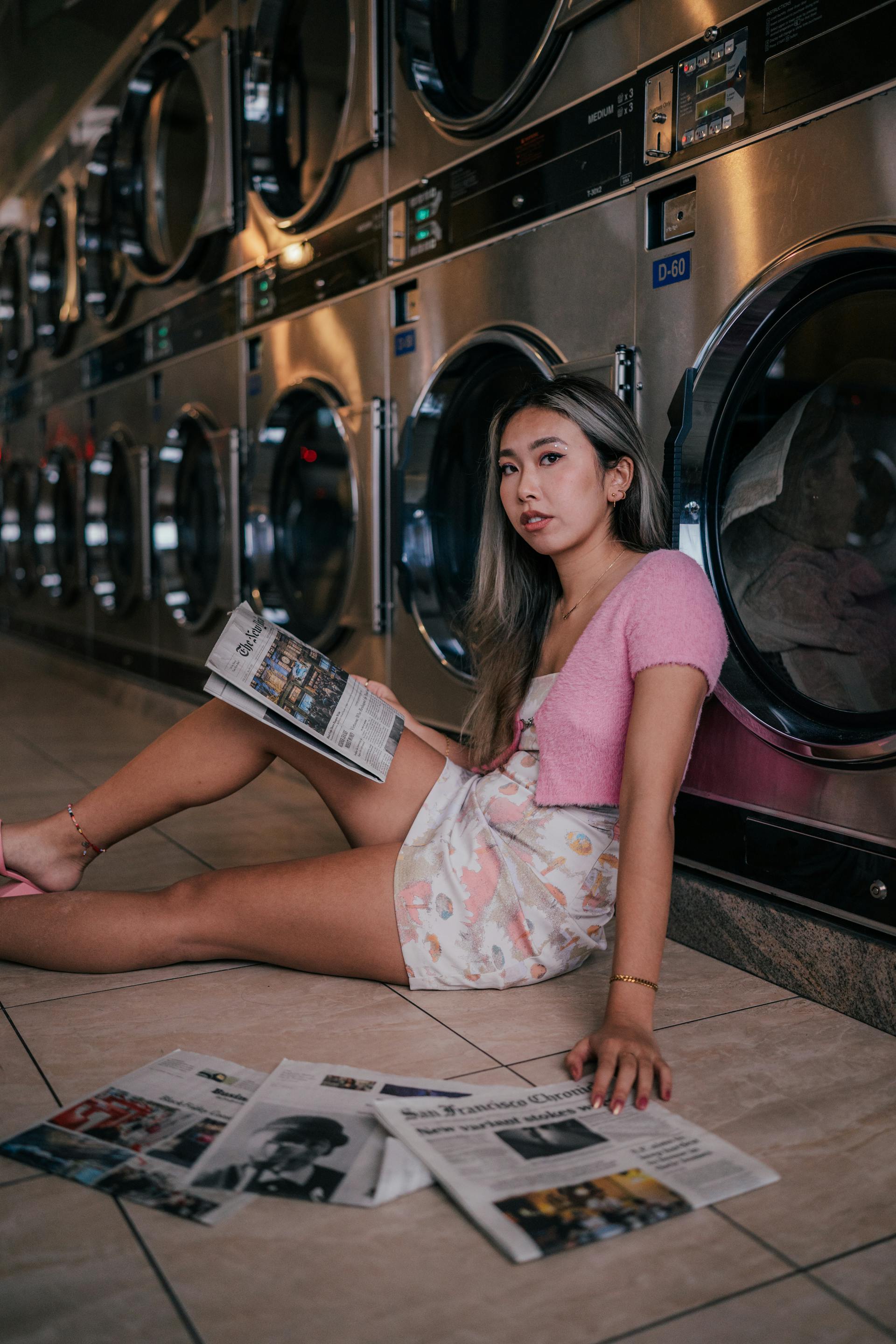 A woman in a laundry room | Source: Pexels