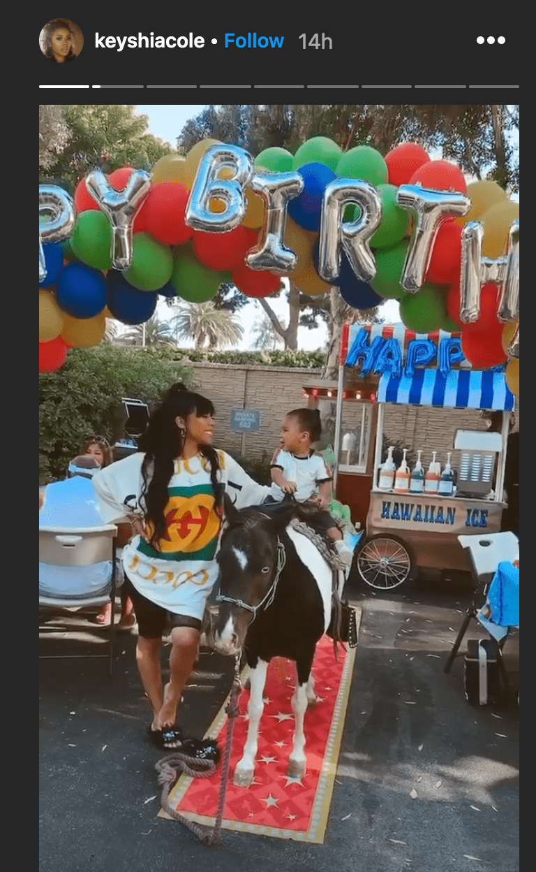 Keyshia Cole stands next to a pony as her son Tobias Khale enjoyed a ride | Source: Instagram.com/keyshiacole