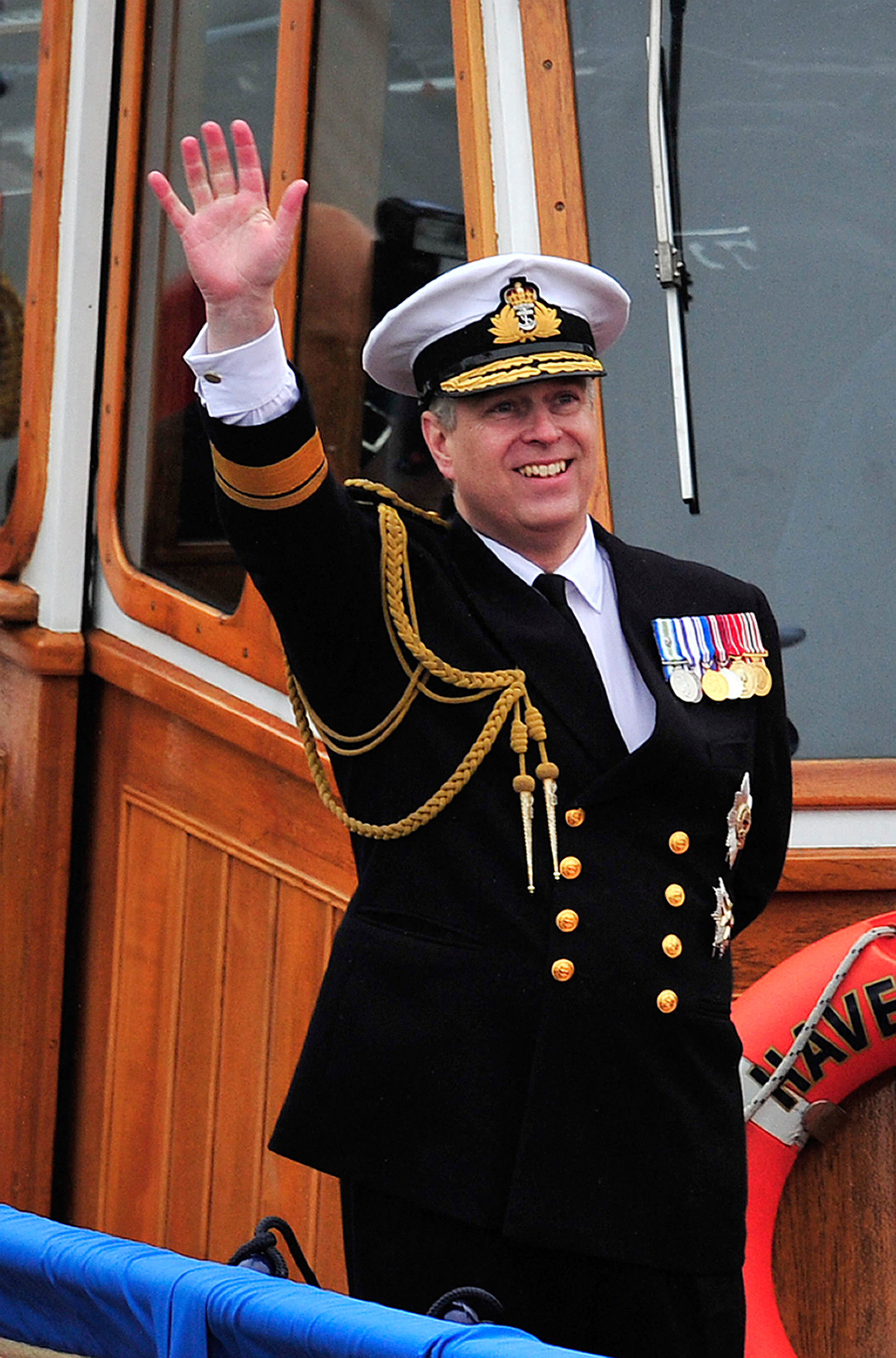 Andrew Mountbatten-Windsor waves as he takes part in the Diamond Jubilee Pageant on the River Thames on 3 June 2012 in London, England. | Source: Getty Images