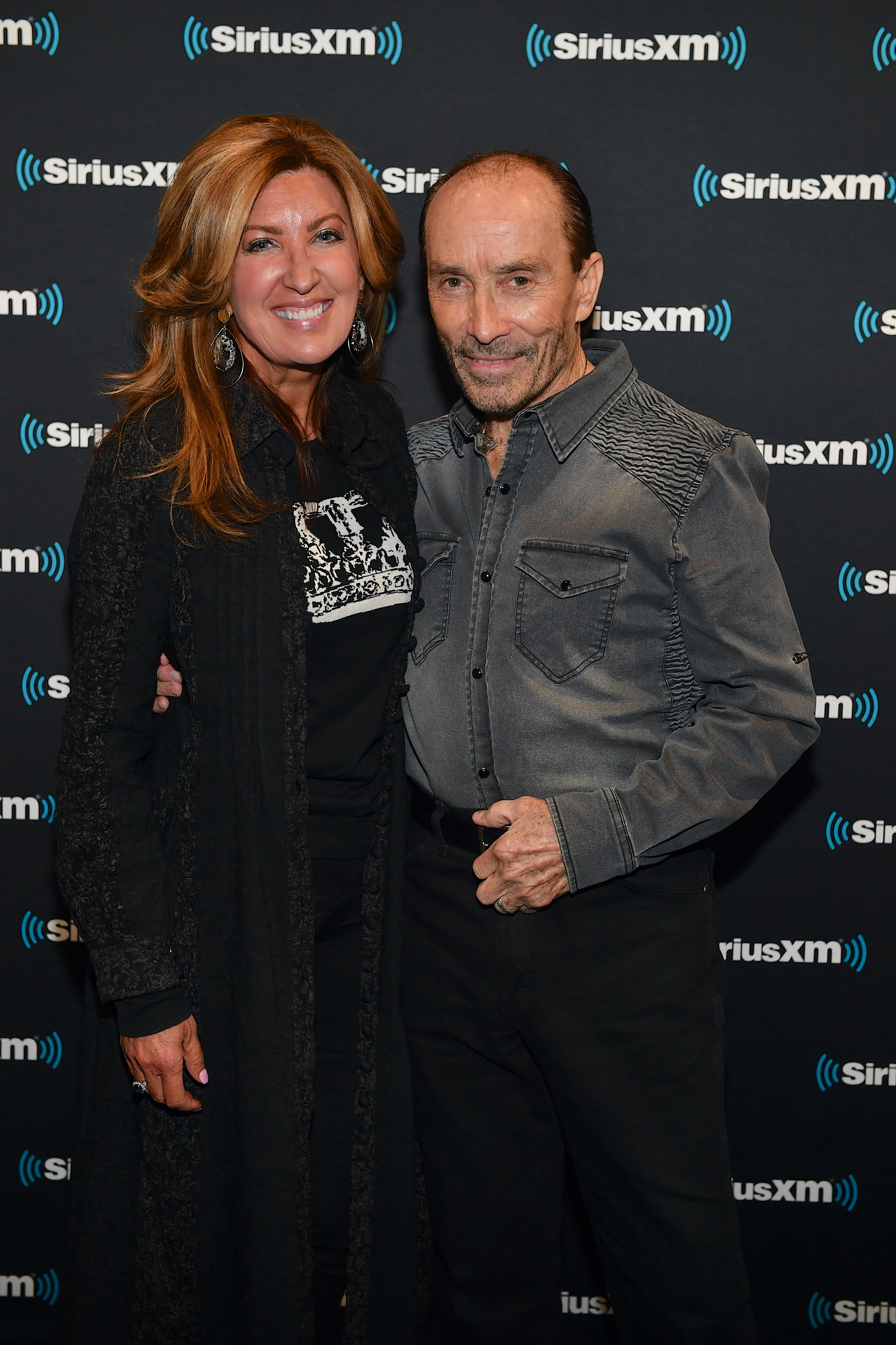 Lee Greenwood and Kimberly Payne are pictured as they arrive at SiriusXM Nashville Studios at Bridgestone Arena on January 30, 2020, in Nashville, Tennessee | Source: Getty Images
