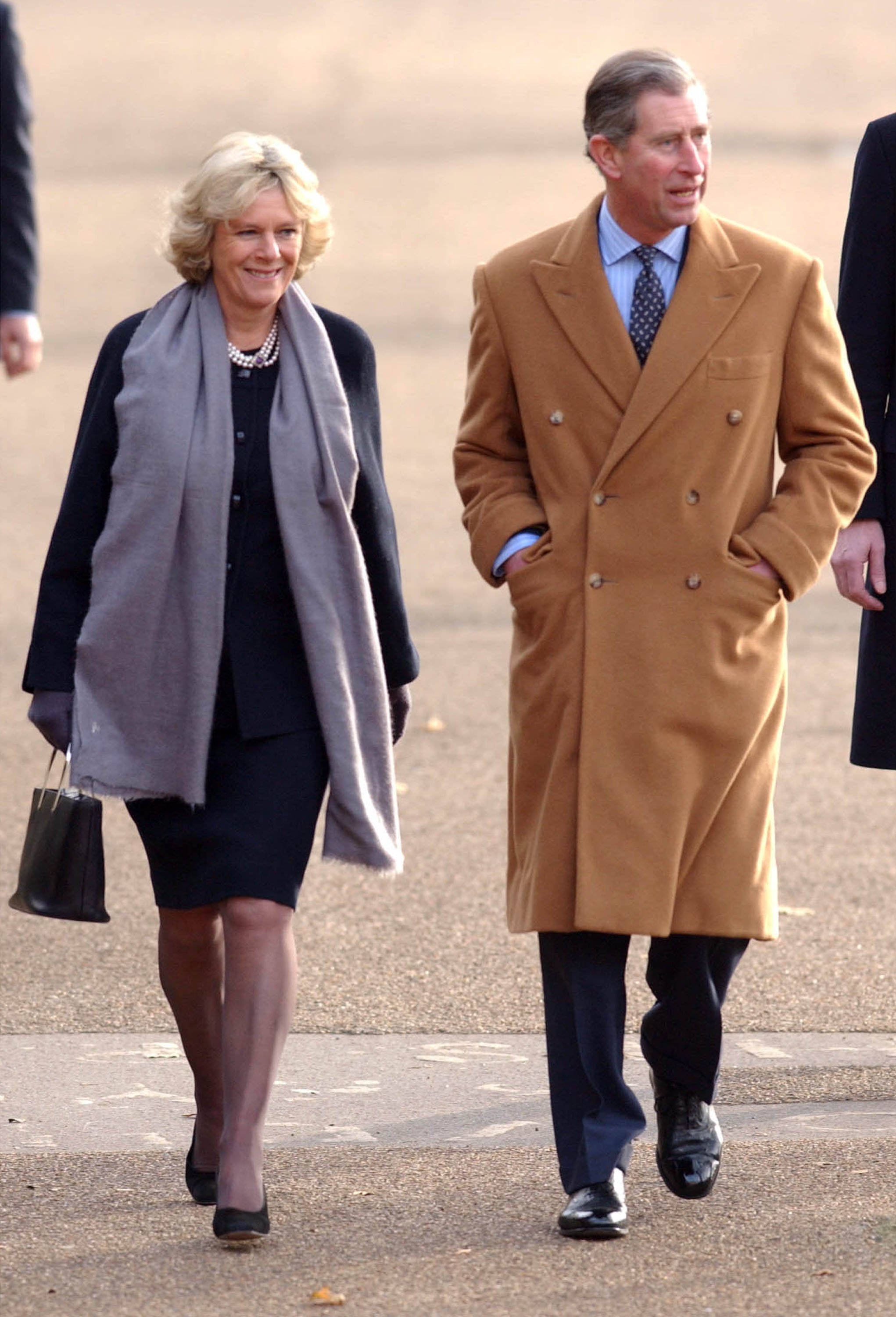 Prince Charles and Camilla Parker Bowles attend the St. James Palace Christmas party at the Ritz December 19, 2001. | Source: Getty Images