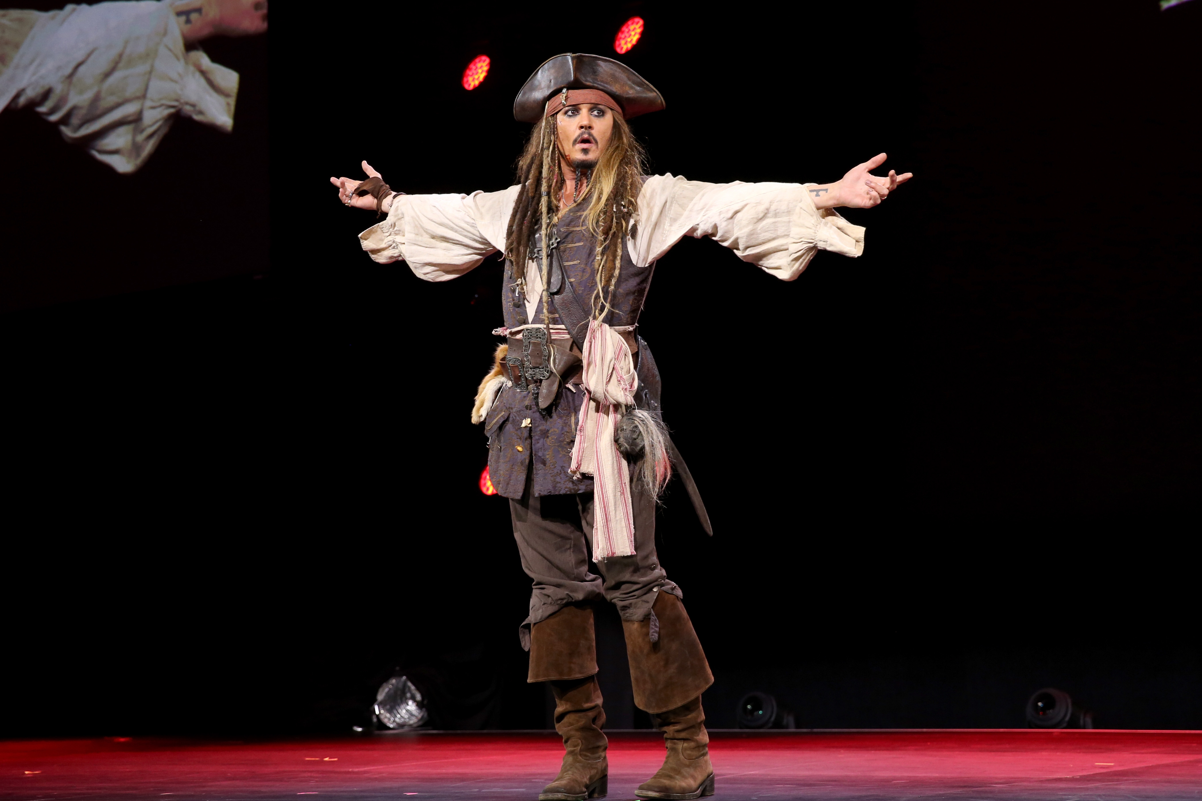 Johnny Depp as Captain Jack Sparrow during the "Worlds, Galaxies, and Universes: Live Action at the Walt Disney Studios" at the D23 Expo in Anaheim, California on August 15, 2015 | Source: Getty Images