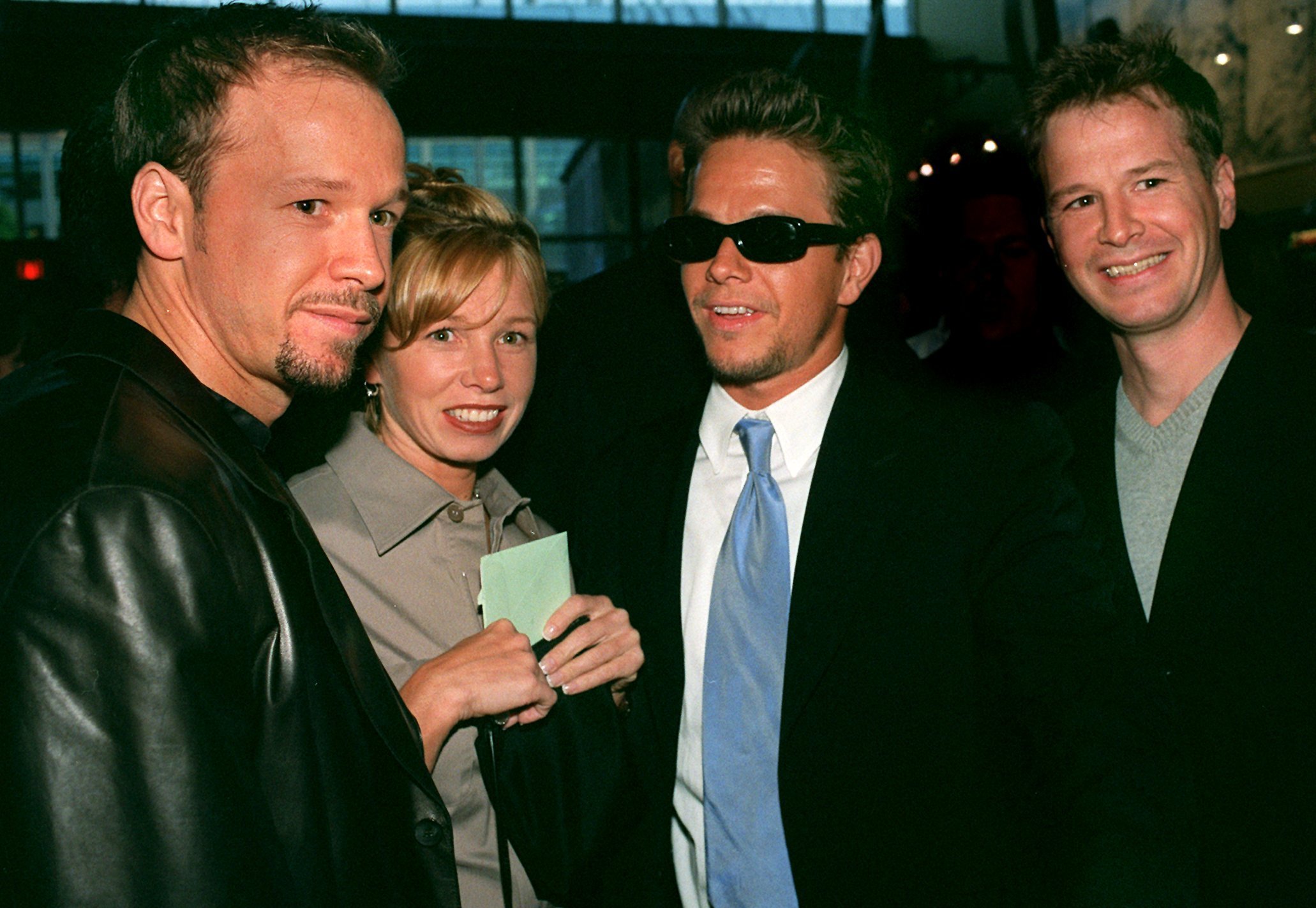 Actor Donnie Wahlberg with his sister, Tracy, and brothers actor Mark Wahlberg and Bob Wahlberg at the opening of "Southie," at the at Kendall Square Cinema. / Source: Getty Images