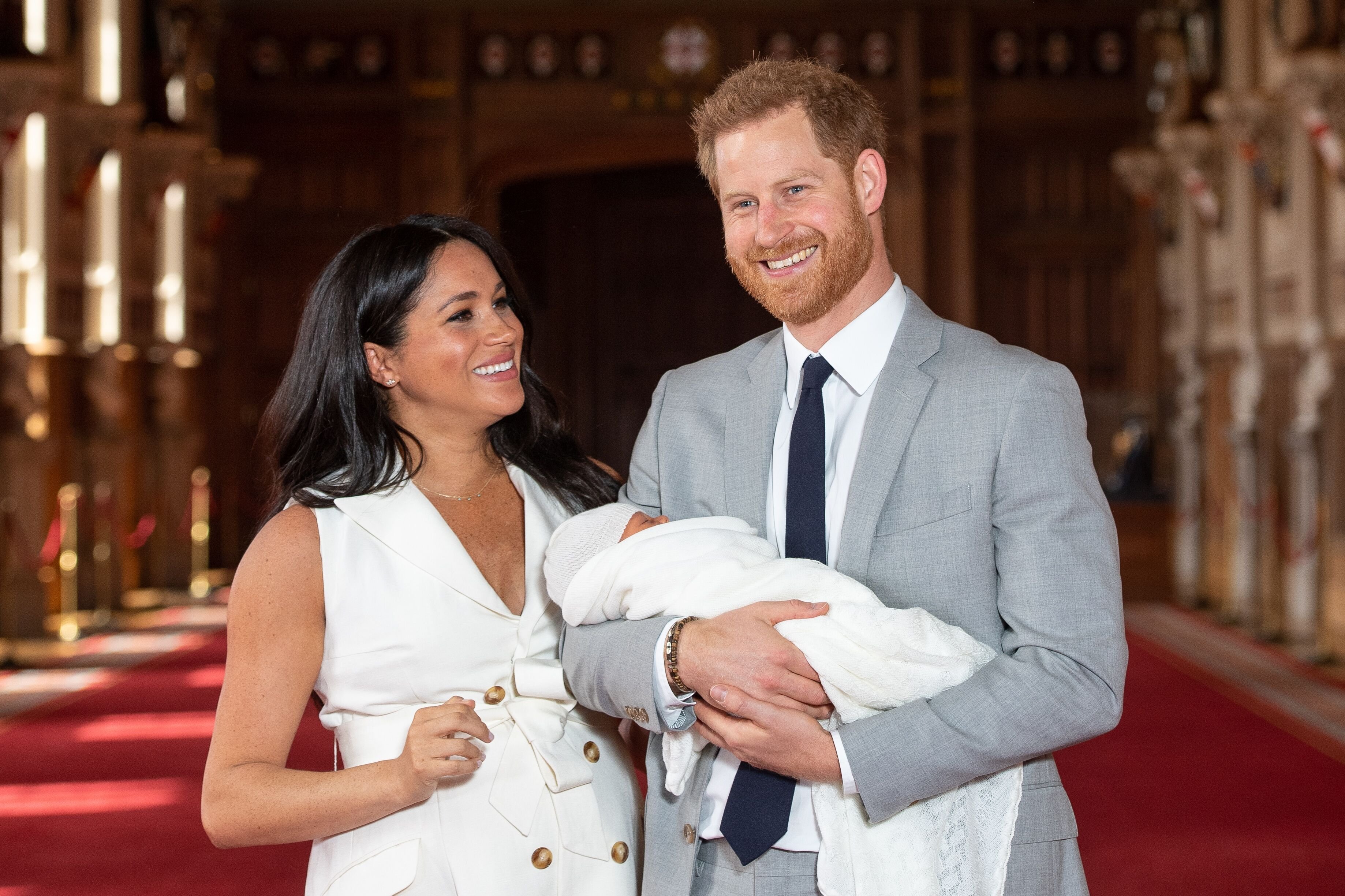 Meghan Markle and Prince Harry introduce baby Archie Harrison at St. George's Hall. | Source: Getty Images