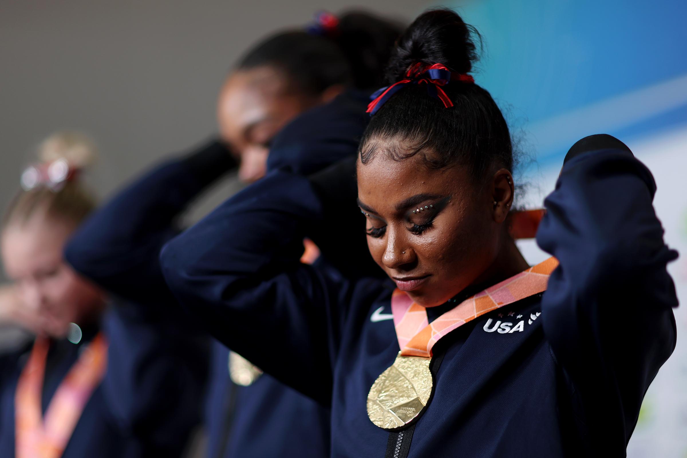 Jordan Chiles adjusts her medal after her team won the Gold medal in the Womens Team Final during the 2022 Gymnastics World Championships on November 1, 2022, in Liverpool, England.