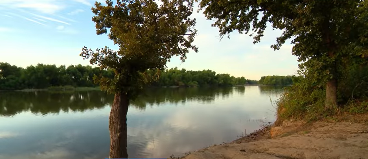 A view of the Brazos River in Johnson County, where the two boys drowned, from a video dated October 8, 2025 | Source: YouTube/@CBSDFW