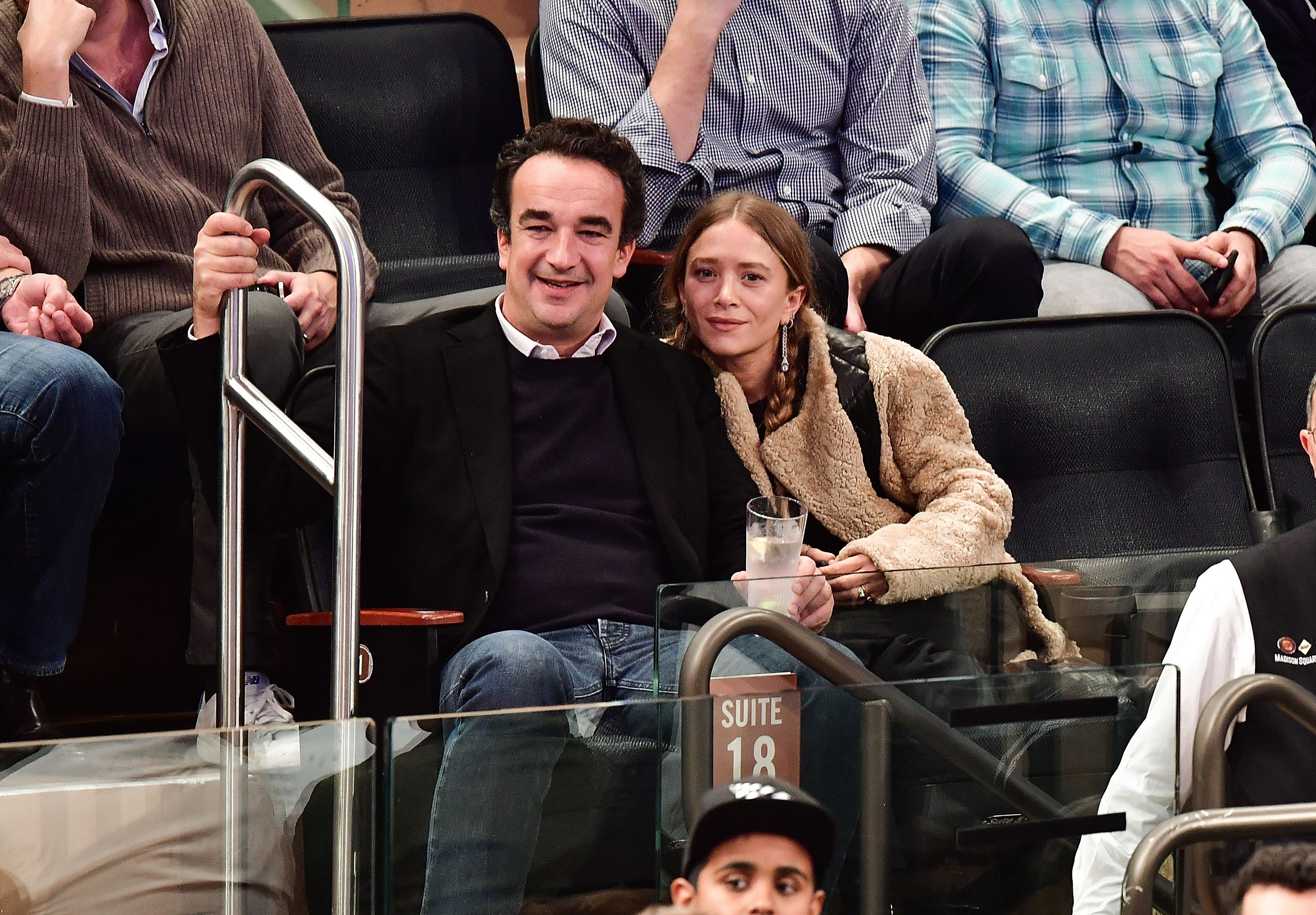 NEW YORK, NY - NOVEMBER 09: (EXCLUSIVE COVERAGE PREMIUM RATES APPLY) Olivier Sarkozy and Mary-Kate Olsen attend New York Knicks vs Brooklyn Nets game at Madison Square Garden on November 9, 2016 in New York City. (Photo by James Devaney/GC Images)