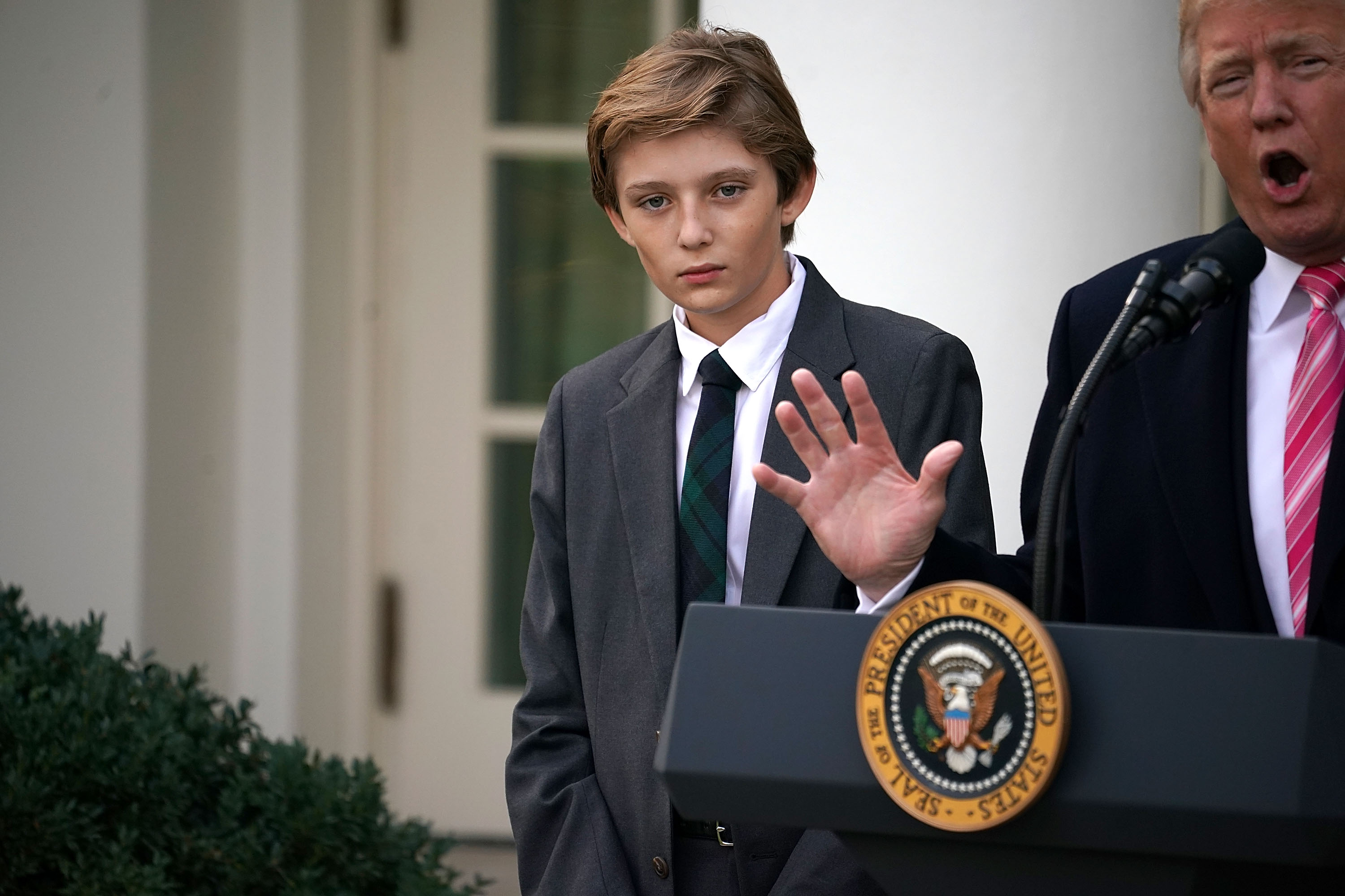 Barron joins President Donald Trump as he makes remarks before pardoning the National Thanksgiving Turkey at the White House on November 21, 2017, in Washington, DC. | Source: Getty Images