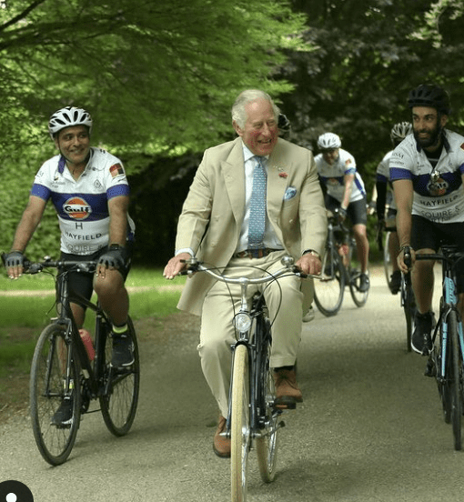 Prince Charles riding with cyclists for "Palace on Wheels." | Photo: Instagram/clarencehouse