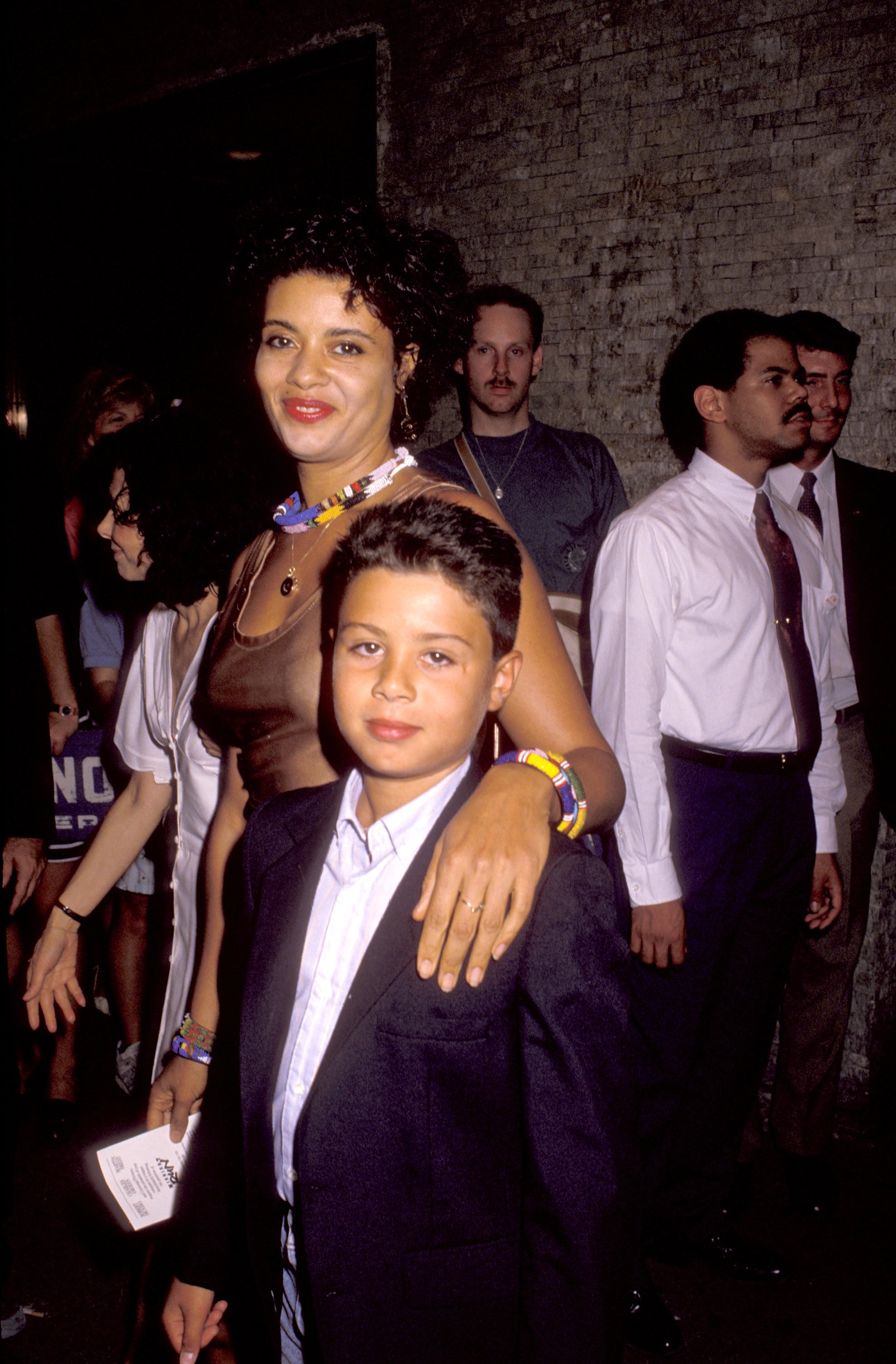 Diahnne Abbott and her son Raphael De Niro attend the "Midnight Run" premiere and party on July 11, 1988, in New York City. | Source: Getty Images