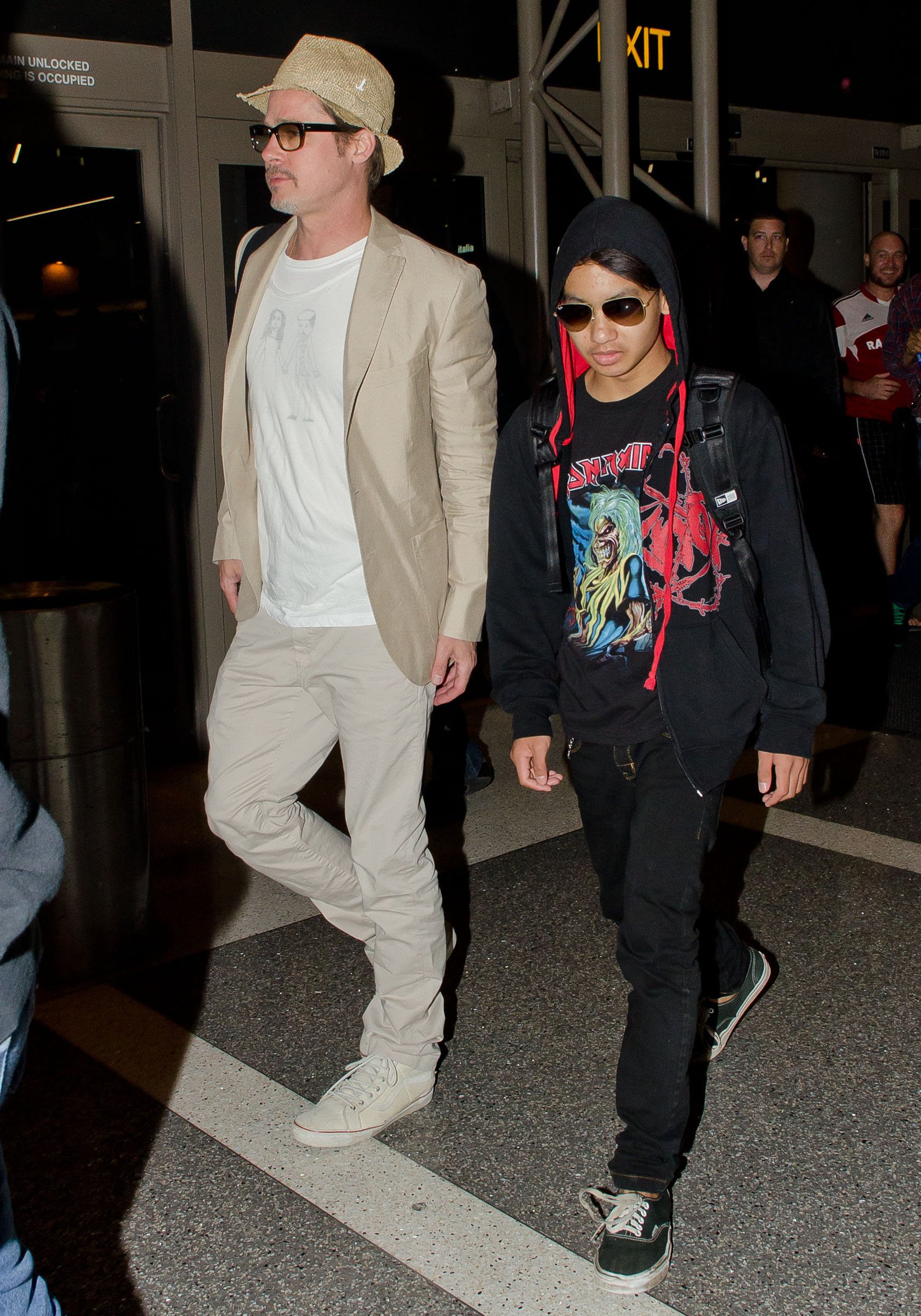 Brad Pitt and Maddox Jolie-Pitt are seen at LAX on June 06, 2014 in Los Angeles, California. | Source: Getty Images