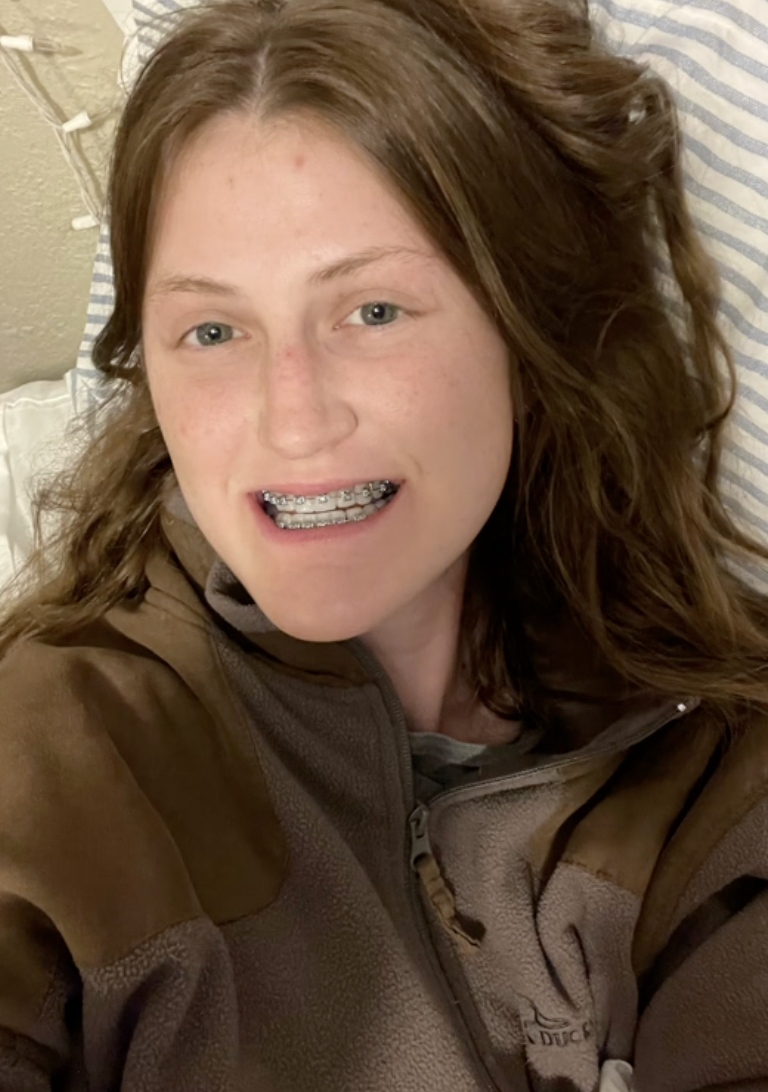 Ahead of surgery, Virginia Elder smiles with braces, a visible step in her long transformation. | Source: TikTok/virginiaeelder