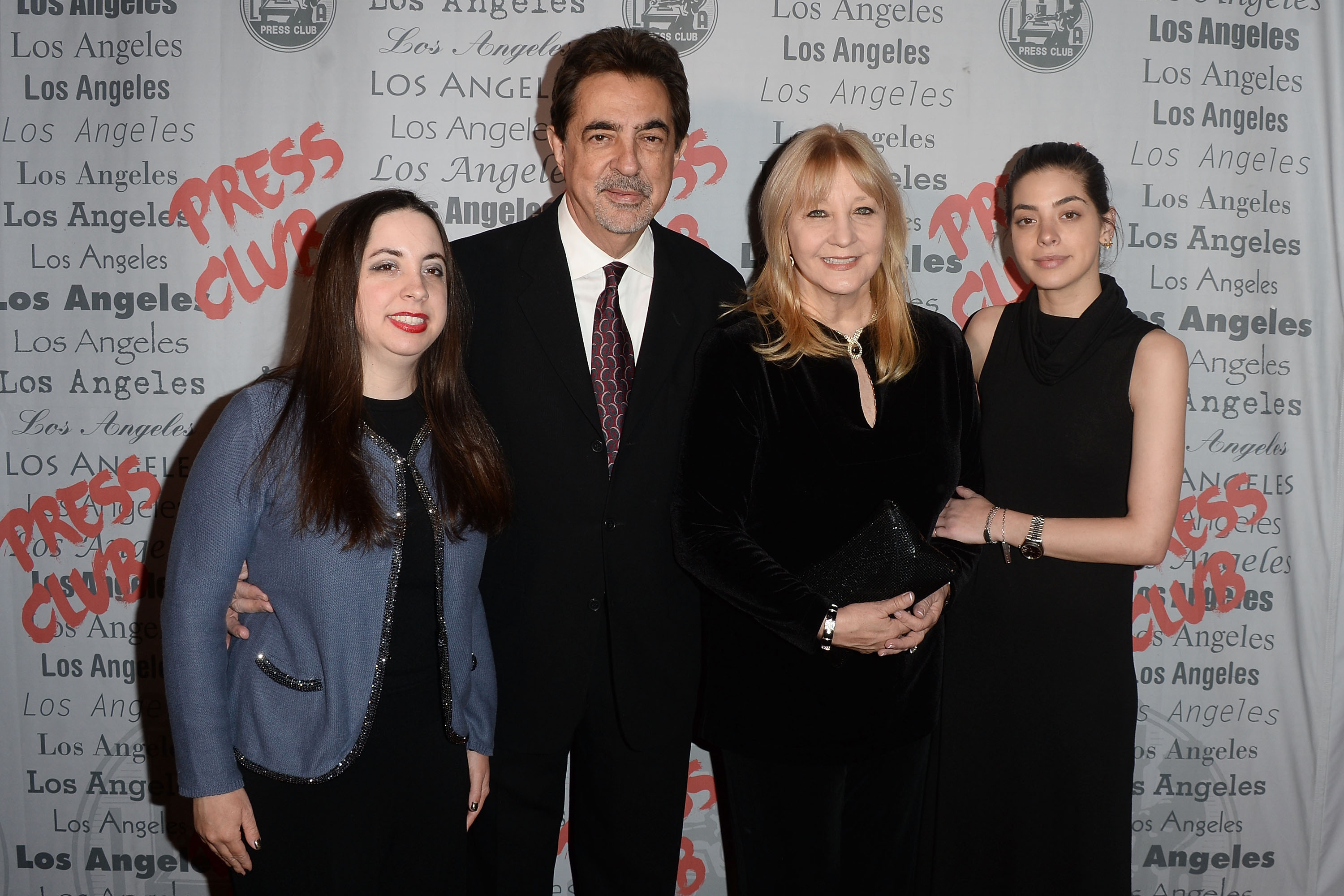 (L-R) Mia Mantegna, Joe Mantegna, Arlene Vrhel, and Gia Mantegna arrive at the National Arts and Entertainment Journalism Awards Gala at Millennium Biltmore Hotel on December 6, 2015, in Los Angeles, California. | Source: Getty Images