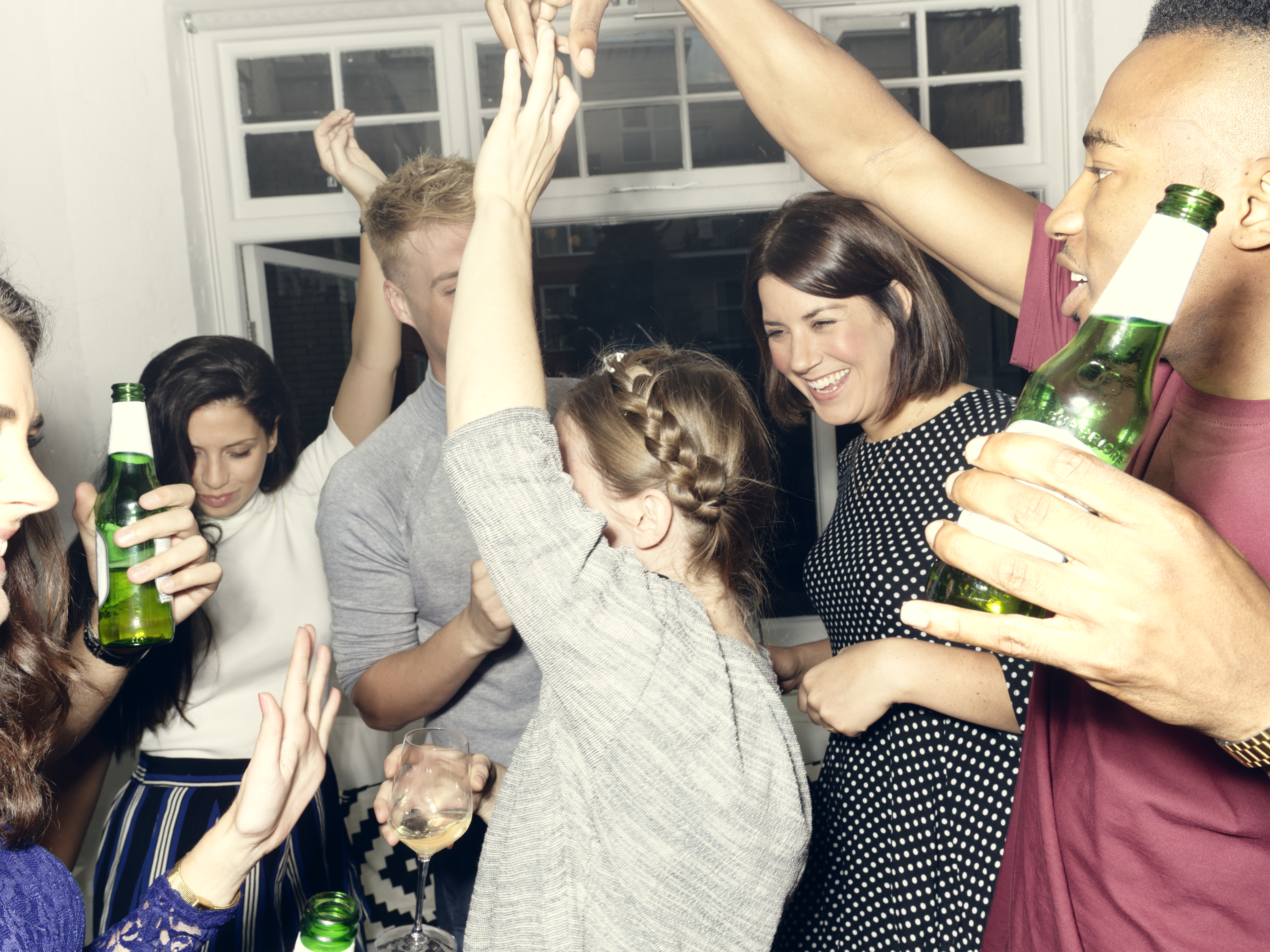 A party in an apartment | Source: Getty Images