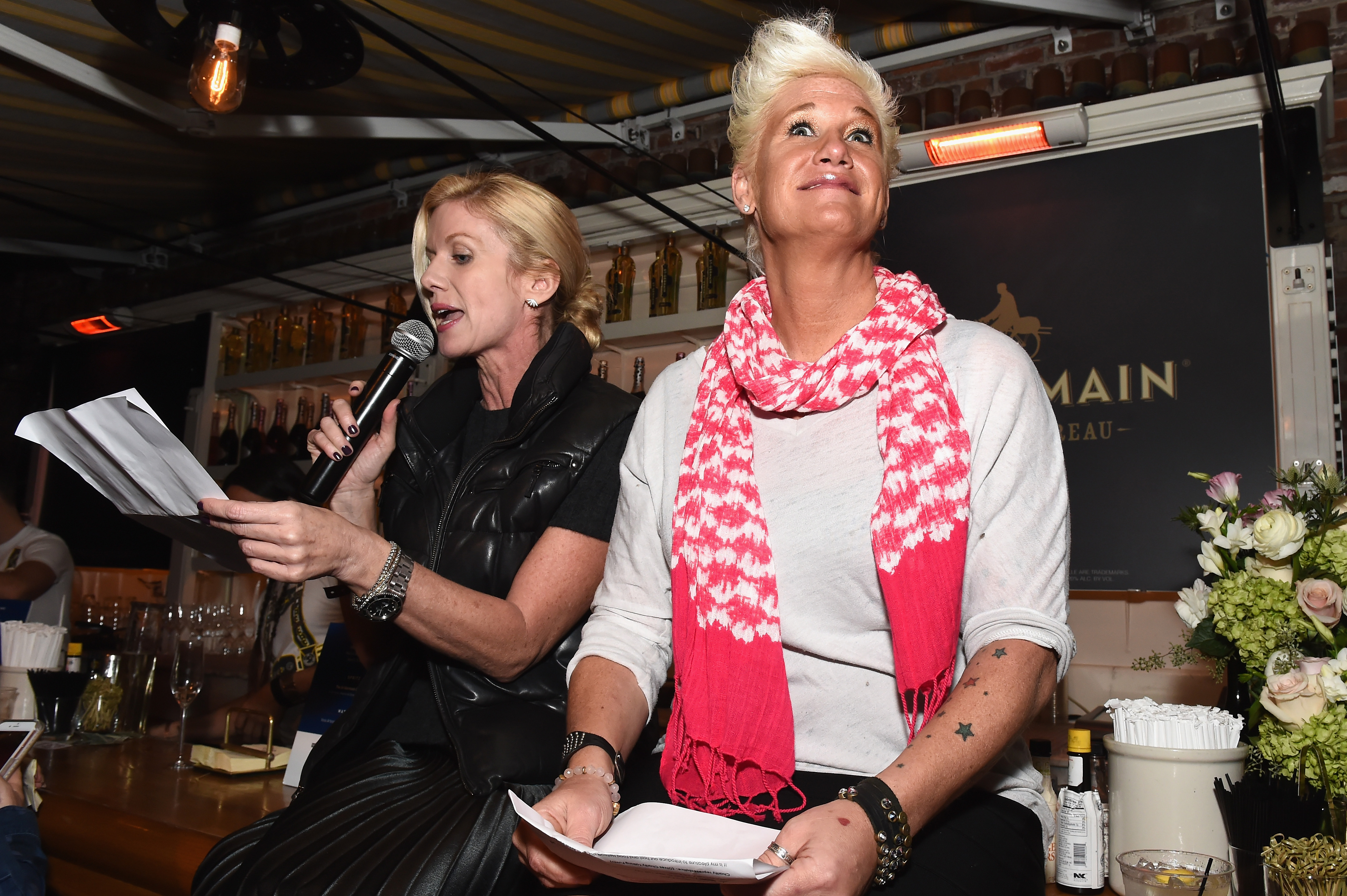 Chef Anne Burrell holds notes while attending a New York City Wine & Food Festival event on October 14, 2016 | Source: Getty Images
