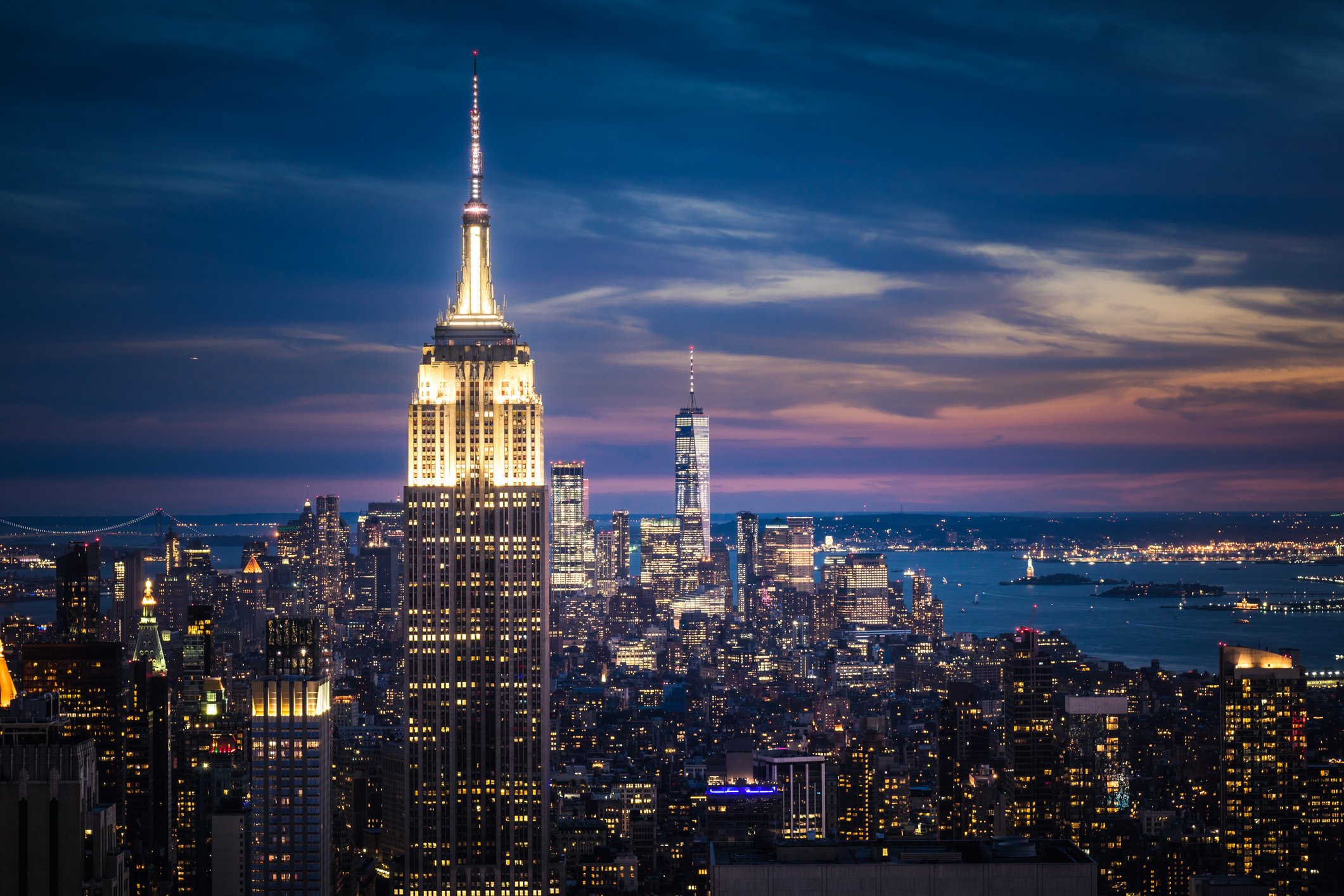 A photo of Empire State Building and New York City skyline at night. | Photo: Getty Images