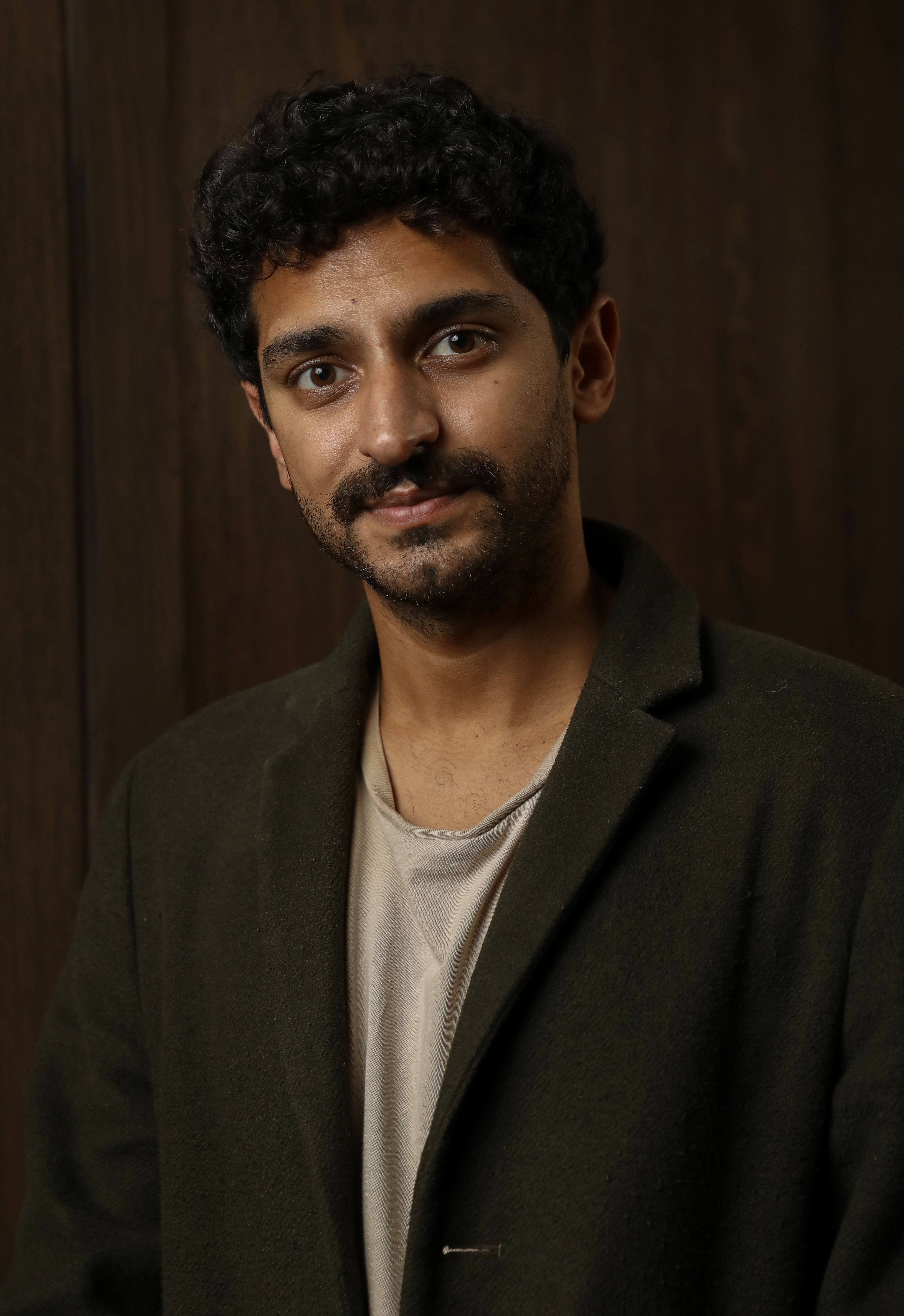 Karan Soni poses during a portrait session at the Filmmaker Teas during the 65th BFI London Film Festival at The May Fair Hotel on October 13, 2021, in London, England | Source: Getty Images