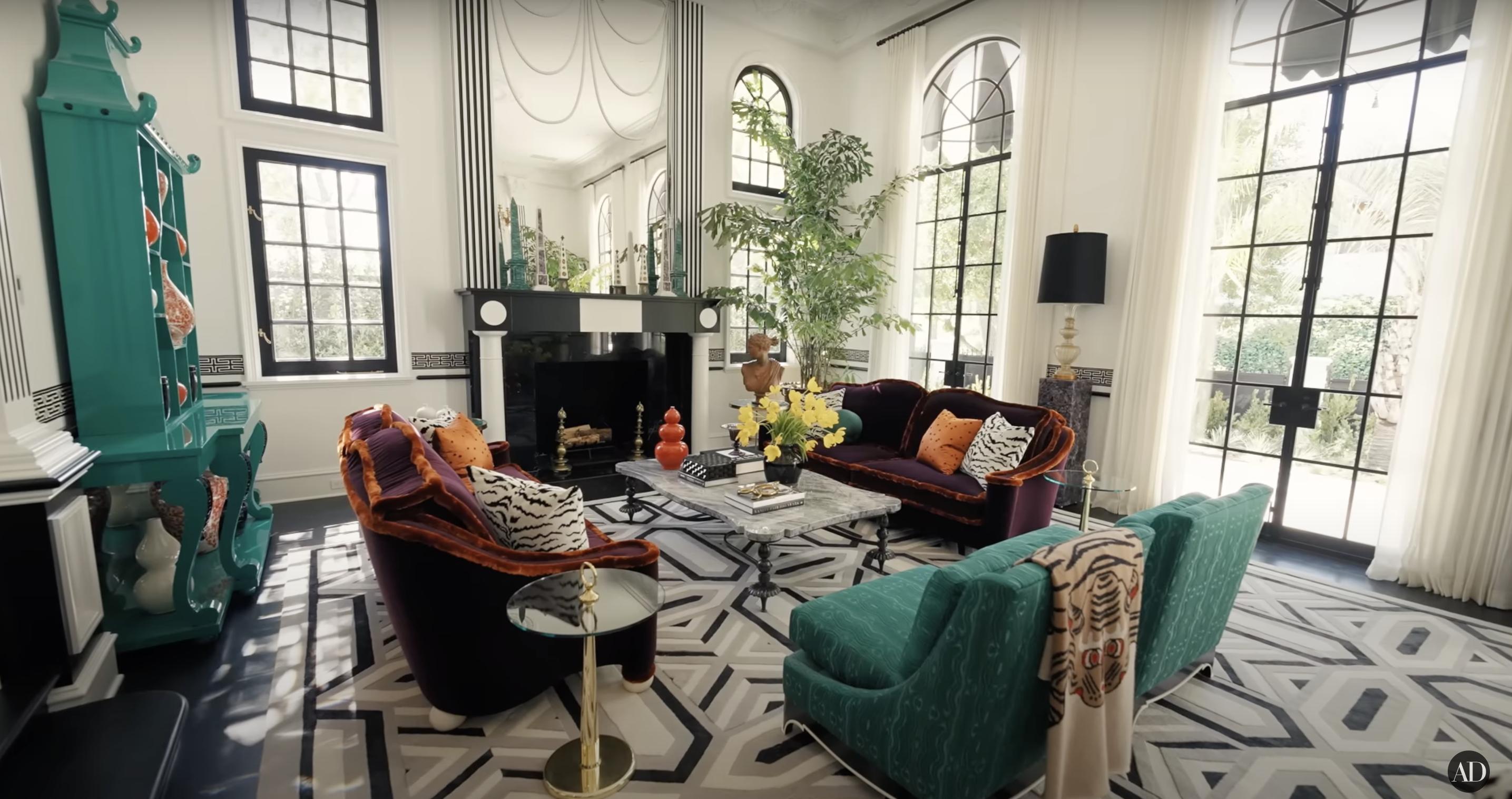 The formal living room at RuPaul and Georges LeBar's home in Beverly Hills | Source: https://www.youtube.com/@Archdigest