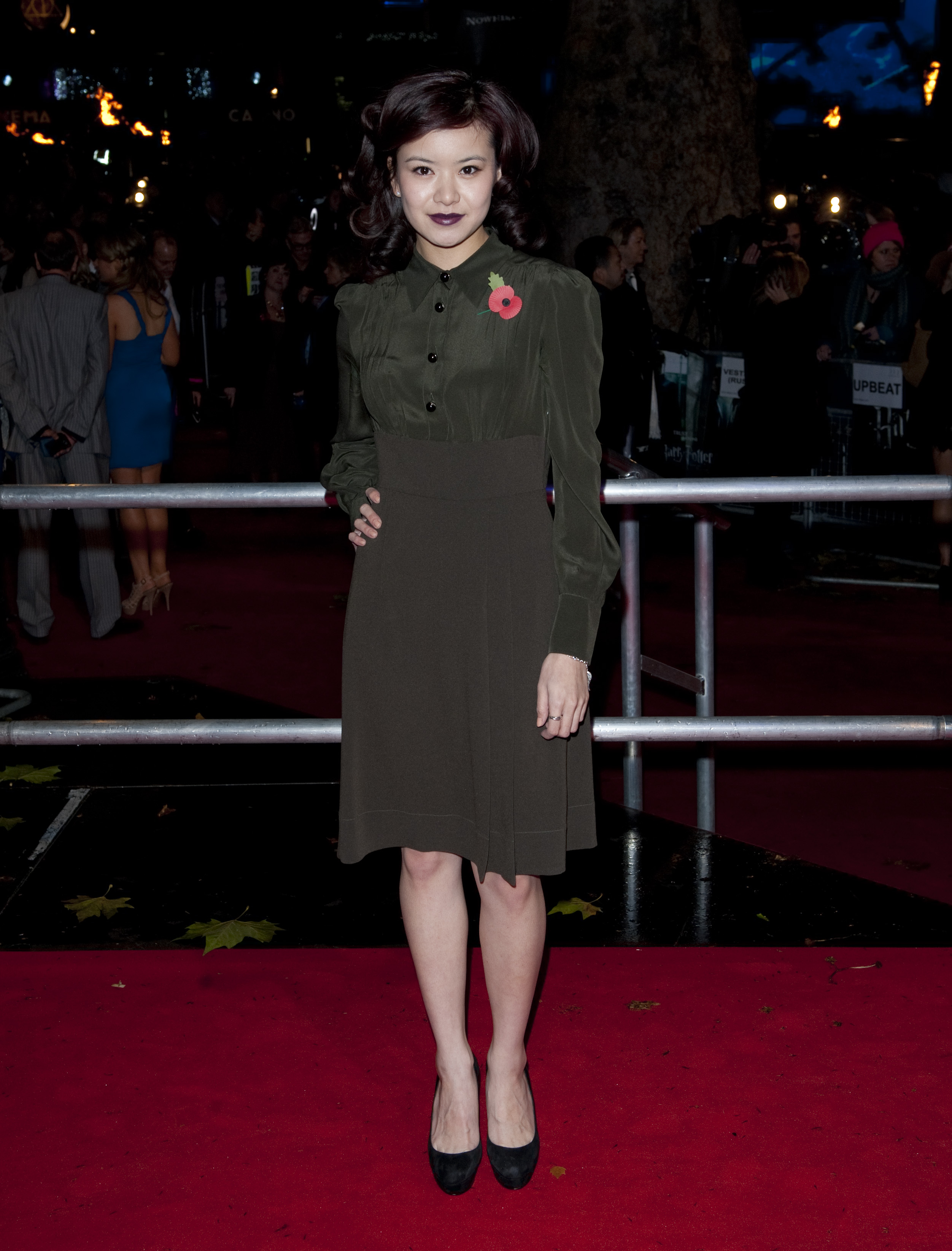 Katie Leung returned to the red carpet for the world premiere of "Harry Potter and the Deathly Hallows: Part One" on November 11, 2010, in London, England — a defining moment near the close of the franchise that launched her career. Her vintage-inspired look and composed presence reflected how far she had come since her first appearance in the series.