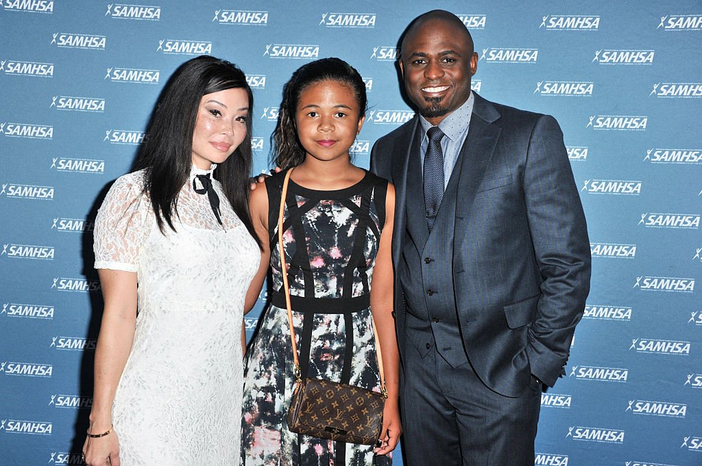 Wayne Brady, his daughter Maile Masako Brady and his ex-wife, Mandie Taketa arrived ay the 10th SAMHSA Voice Awards on August 12, 2015, in Westwood, California | Source: Allen Berezovsky/Getty Images