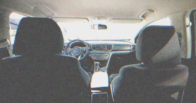 A photo of a car taken from the back seat. | Source: Shutterstock