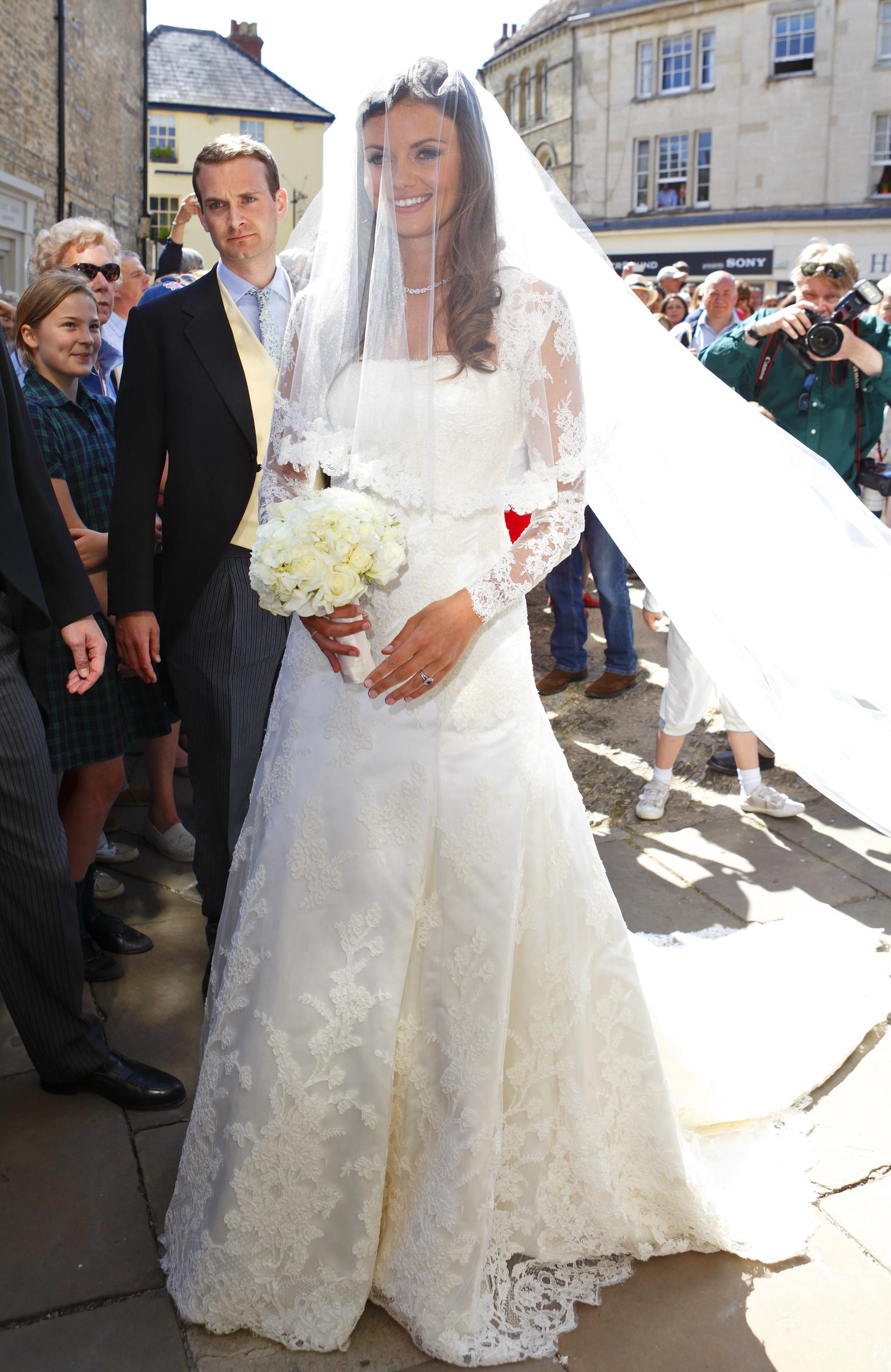 Lady Natasha Rufus Isaacs arrives at the church of St John the Baptist for her and Rupert Finch's wedding on June 8, 2013 in Cirencester, England | Source: Getty Images