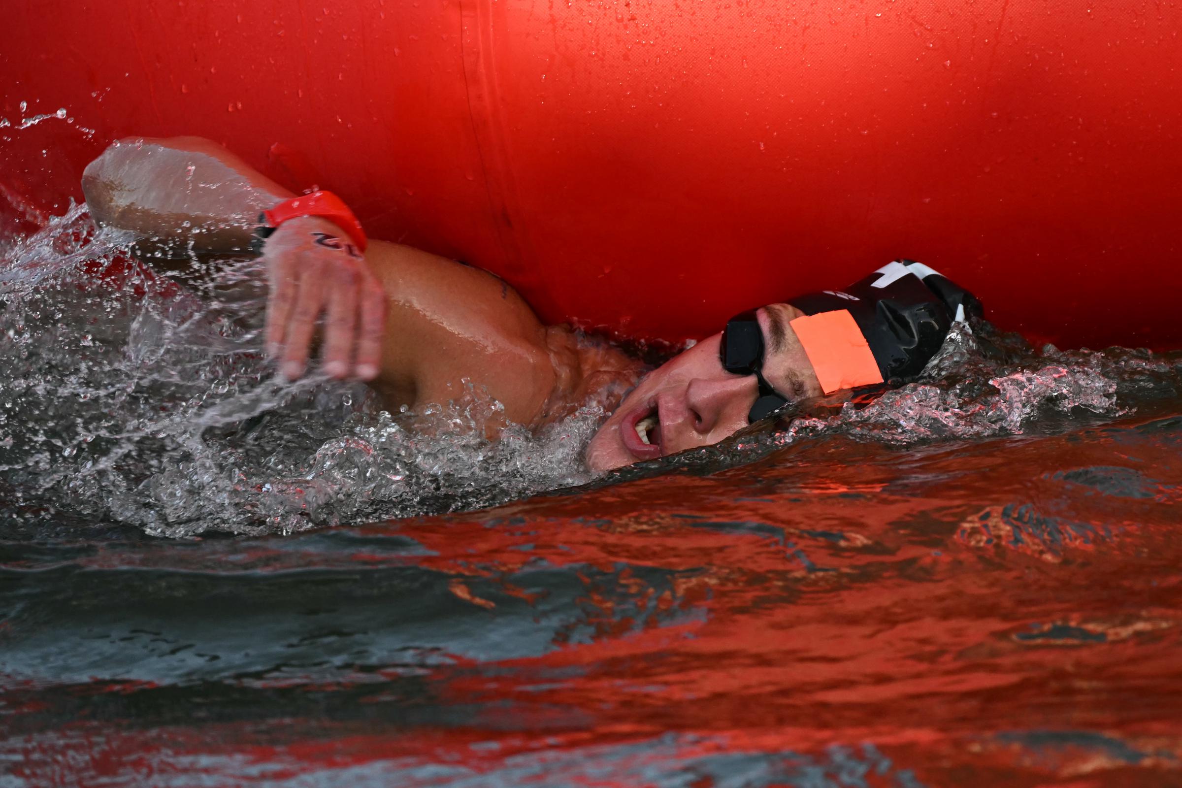 Ivan Puskovitch swims in the Seine River during the Men's 10km Marathon Swimming Final at the Paris 2024 Olympic Games on August 9, 2024 | Source: Getty Images