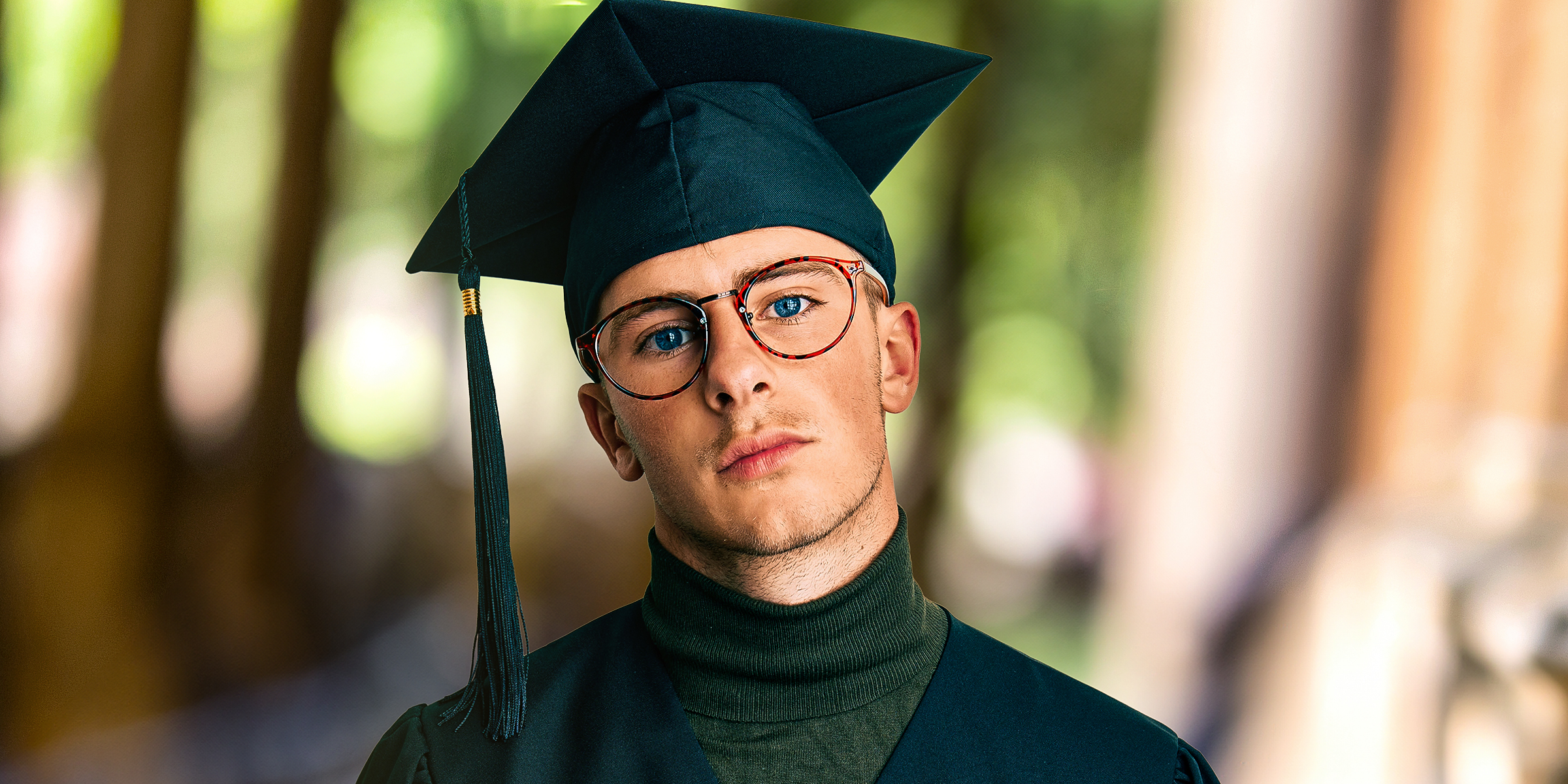 A boy in his graduation outfit | Source: Shutterstock