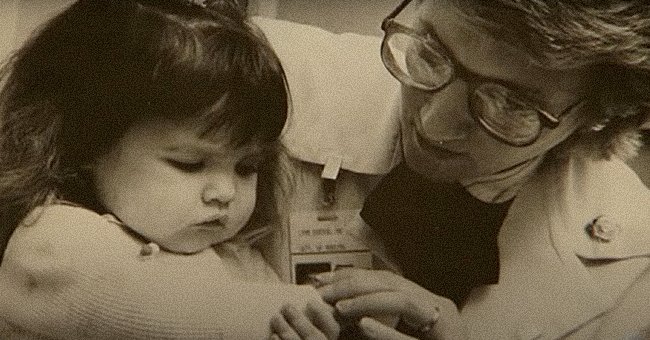 Lynn Bartos nursing a sick child, Nicole Krahn. | Source: youtube.com/CBS Evening News 