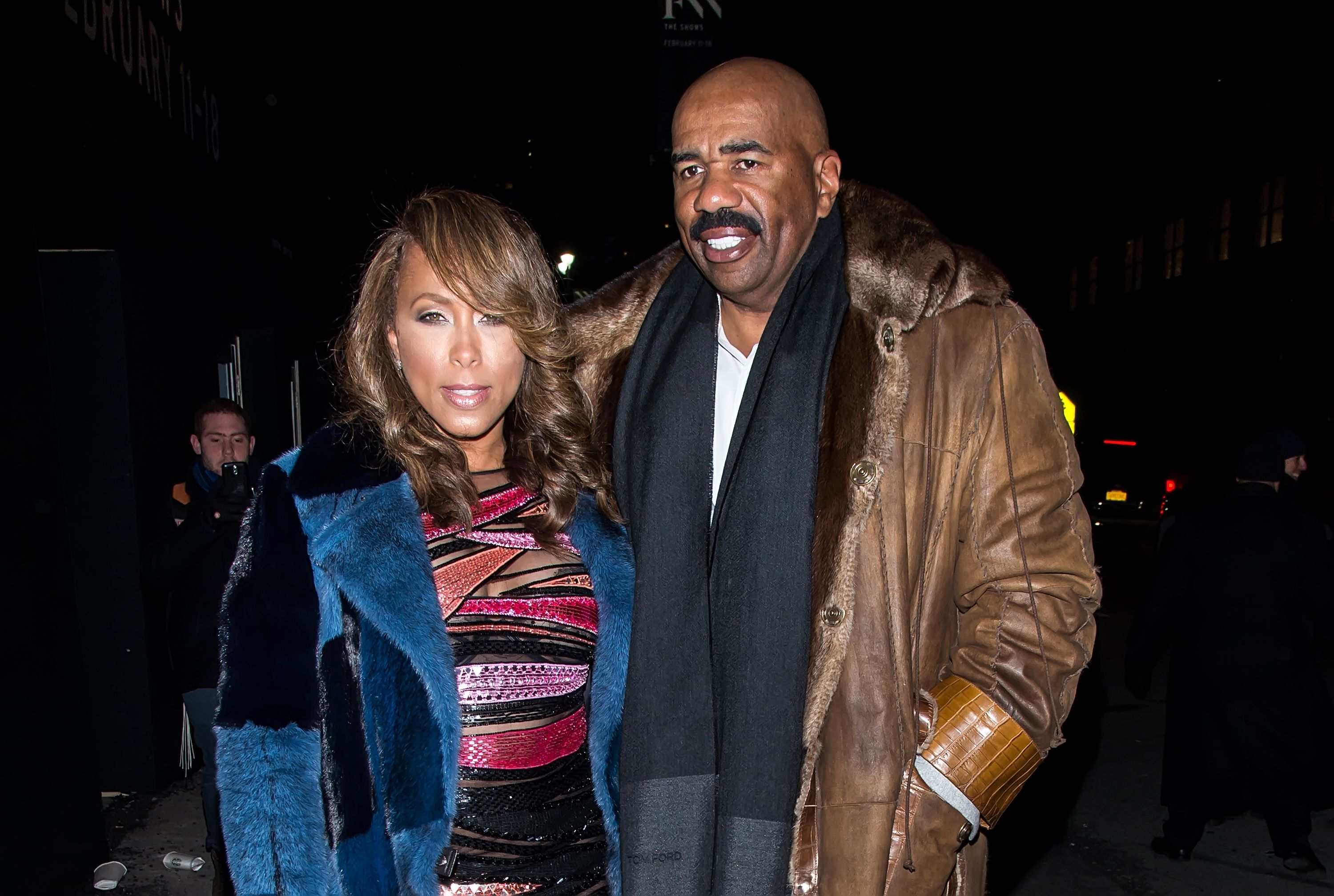 Marjorie Harvey and Steve Harvey at the Prabal Gurung Fall 2016 fashion show during New York Fashion Week: The Shows at The Arc, Skylight at Moynihan Station on February 14, 2016 | Photo: Getty Images