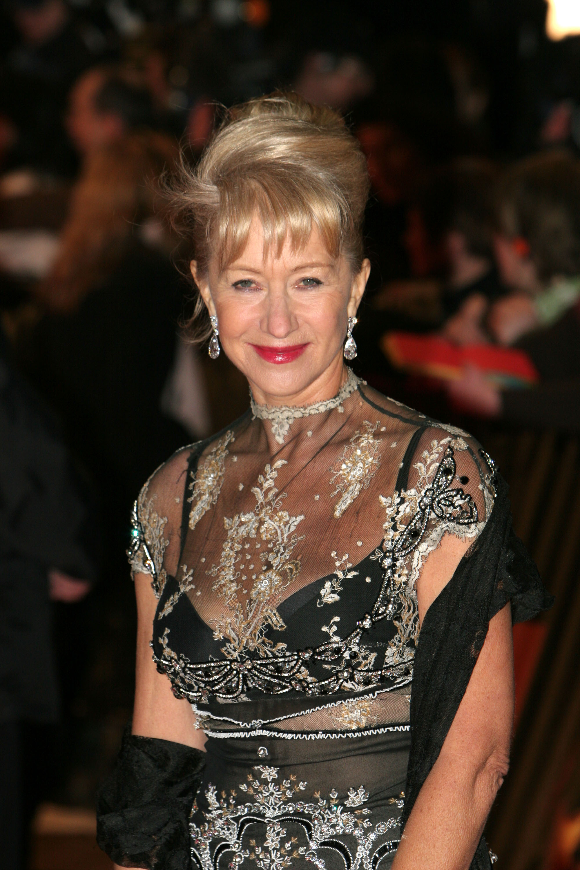 Mirren during the BAFTA Film Awards 2005 at the Odeon Leicester Square in London on 12 February. By now, she had mastered the art of regal red-carpet command, gliding in with an updo, jeweled accents, and an intricately embroidered gown that shimmered with every camera flash.