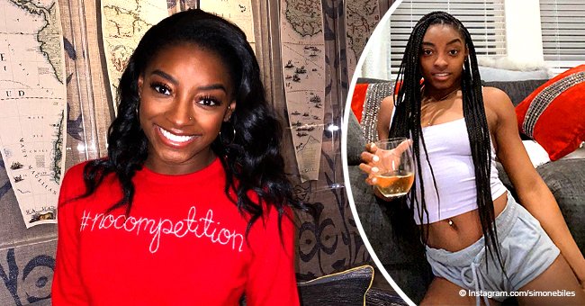 Simone Biles Flaunts Toned Belly & Navel Ring While Sipping Wine in a ...