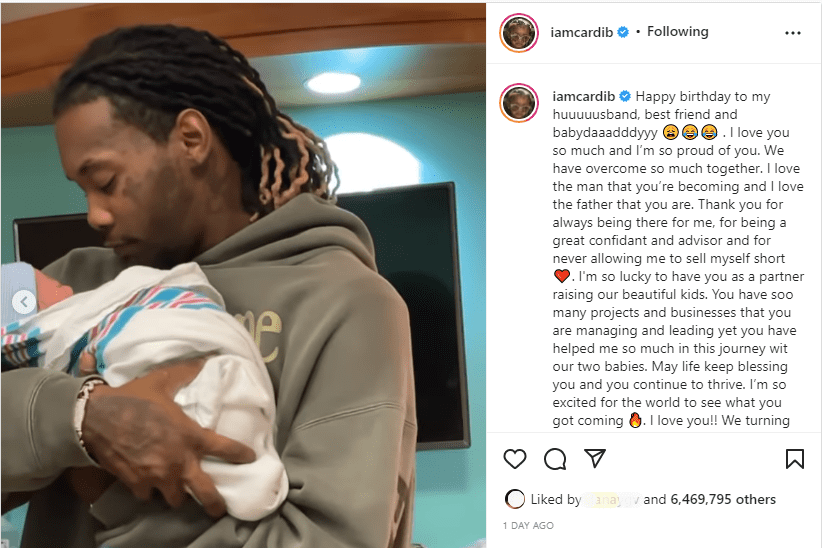 Rapper Offset holding his son in an Instagram post shared by Cardi B | Source: instagram.com/iamcardib