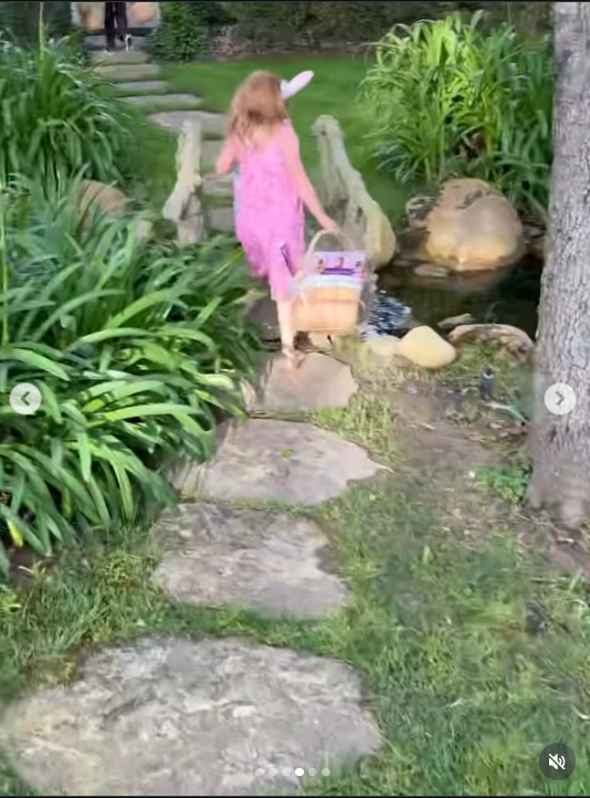 Photo of Lilibet walking across a bridge while holding a basket from a video dated April 6, 2026. | Source: Instagram/meghan