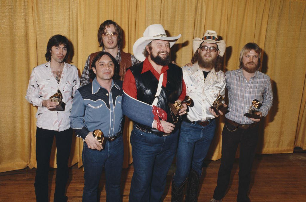 American country musician Charlie Davids and his band, winners of the Grammy Award for Best Country Vocal Performance for "The Devil Went Down to Georgia", pose during The 22nd GRAMMY Awards held on February 27, 1980, at Shrine Auditorium, Los Angeles. | Photo: Getty Images
