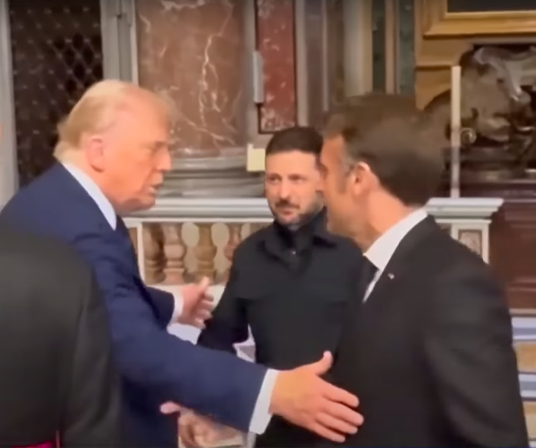 U.S. President Donald Trump talking to Ukrainian President Volodymyr Zelenskyy and French President Emmanuel Macron at Pope Francis' funeral, posted on April 27, 2025. | Source: YouTube/KTLA 5