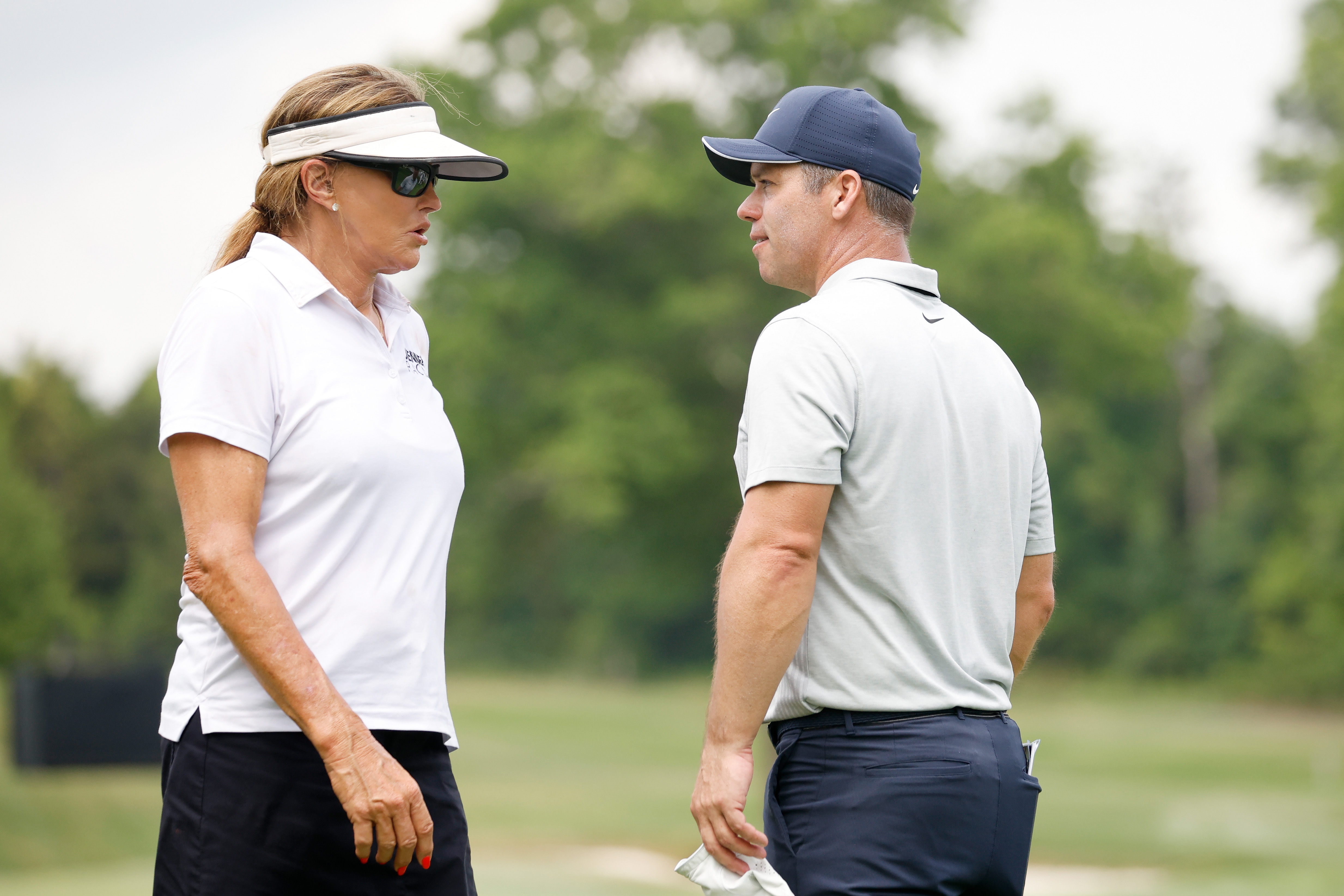 Caitlyn Jenner talks to Paul Casey during the pro-am prior to the LIV Golf Invitational - Bedminster on July 28, 2022 in Bedminster, New Jersey | Source: Getty Images