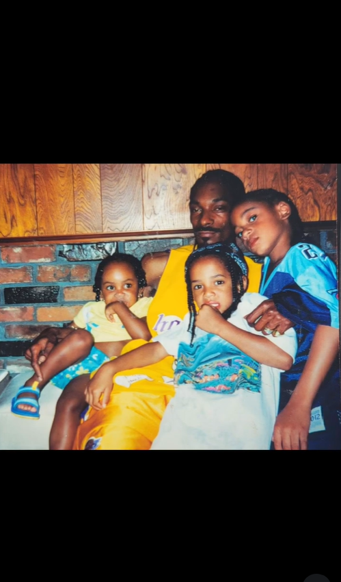 Snoop Dogg enjoys a cozy family moment in this vintage snapshot. | Source: Instagram/snoopdogg