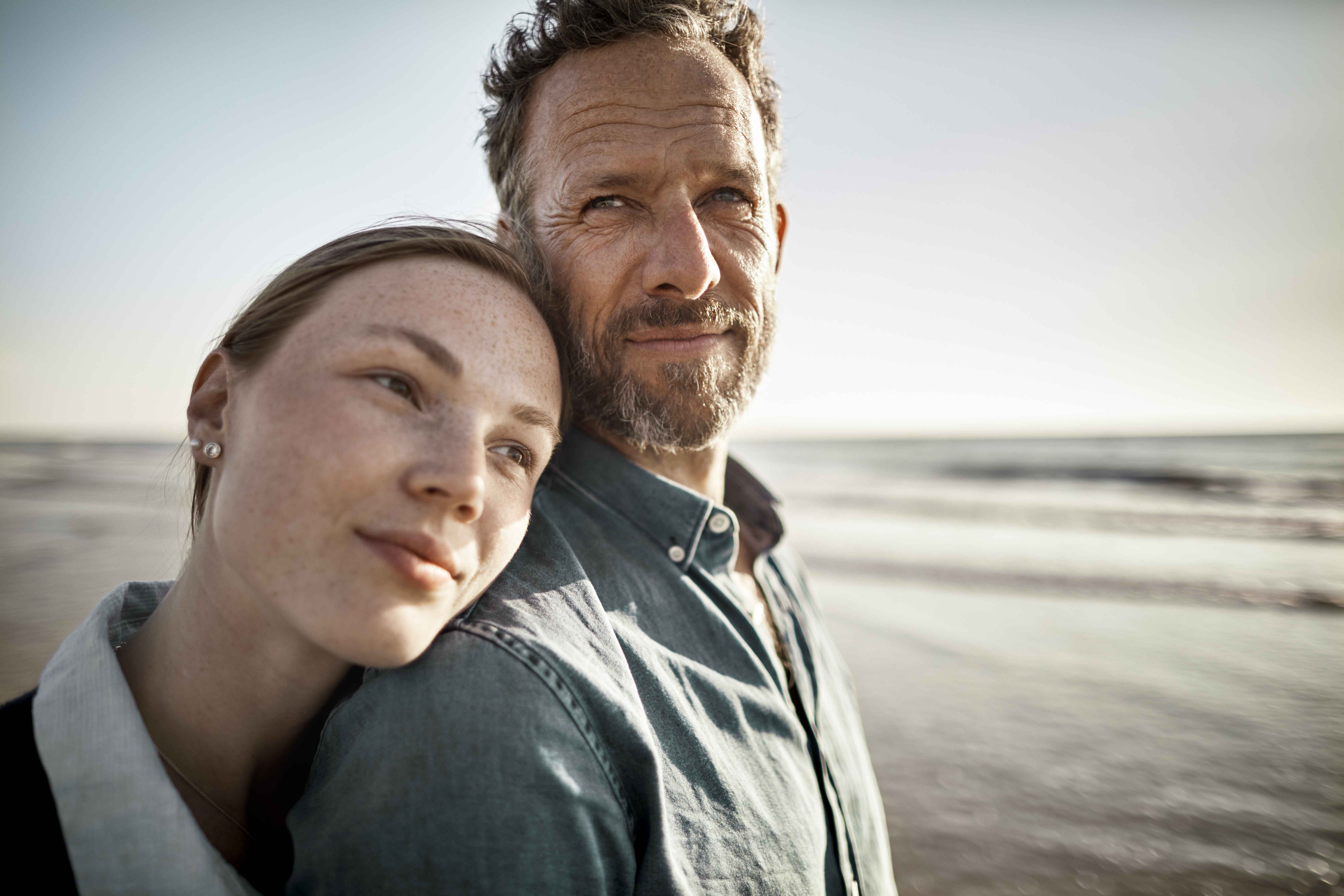 Portrait of man and young woman by the sea | Source: Getty Images