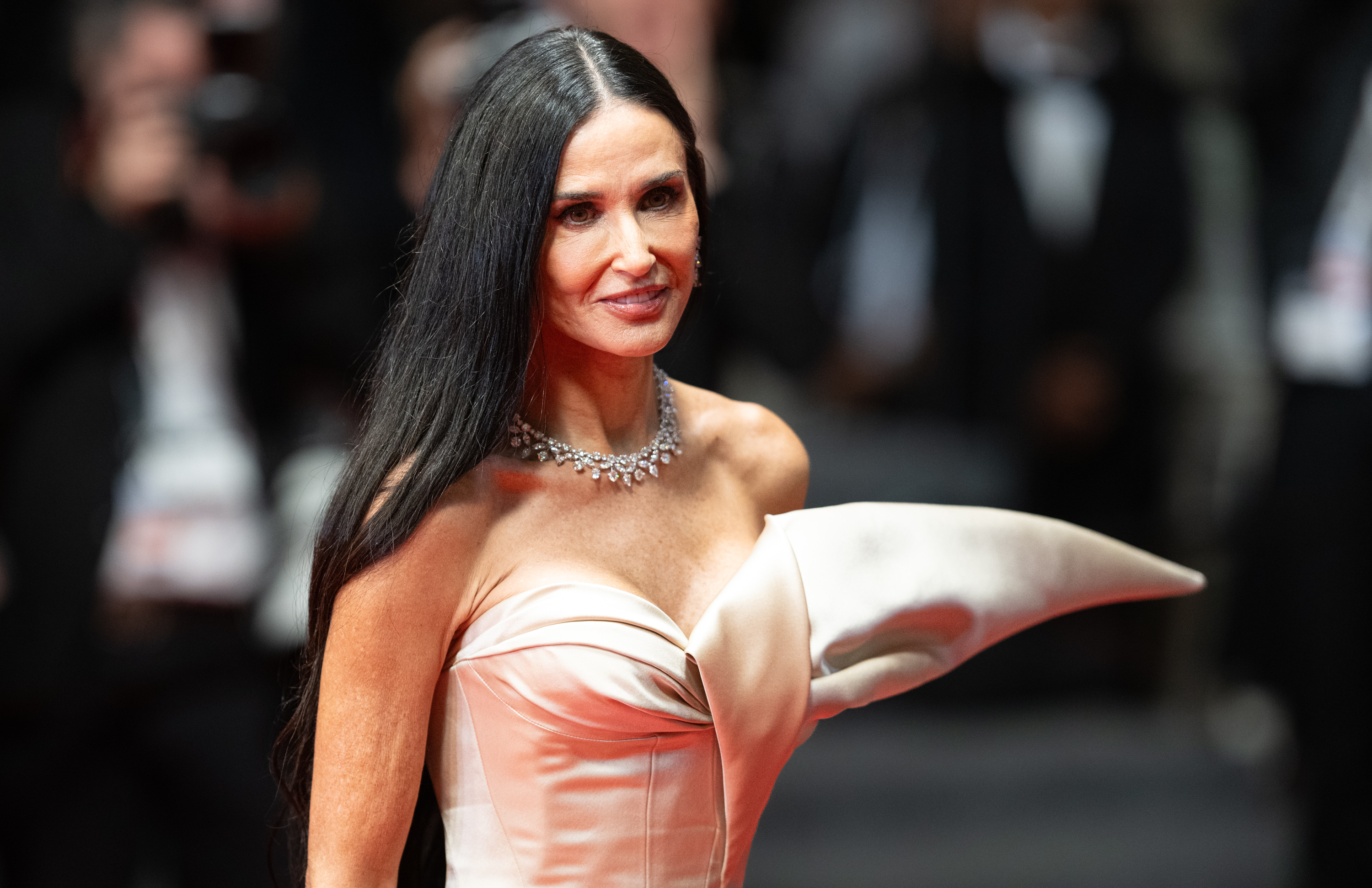 Demi Moore attends the "The Substance" Red Carpet at the 77th annual Cannes Film Festival at Palais des Festivals in Cannes, France, on May 19, 2024. | Source: Getty Images