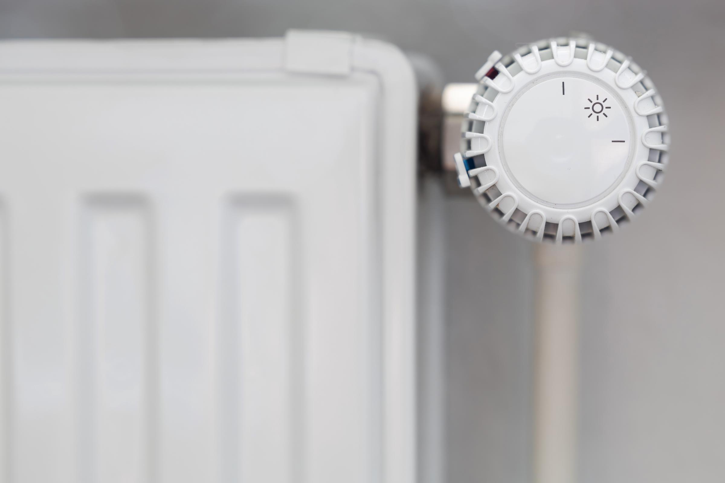 A thermostat on a heater | Source: Getty Images