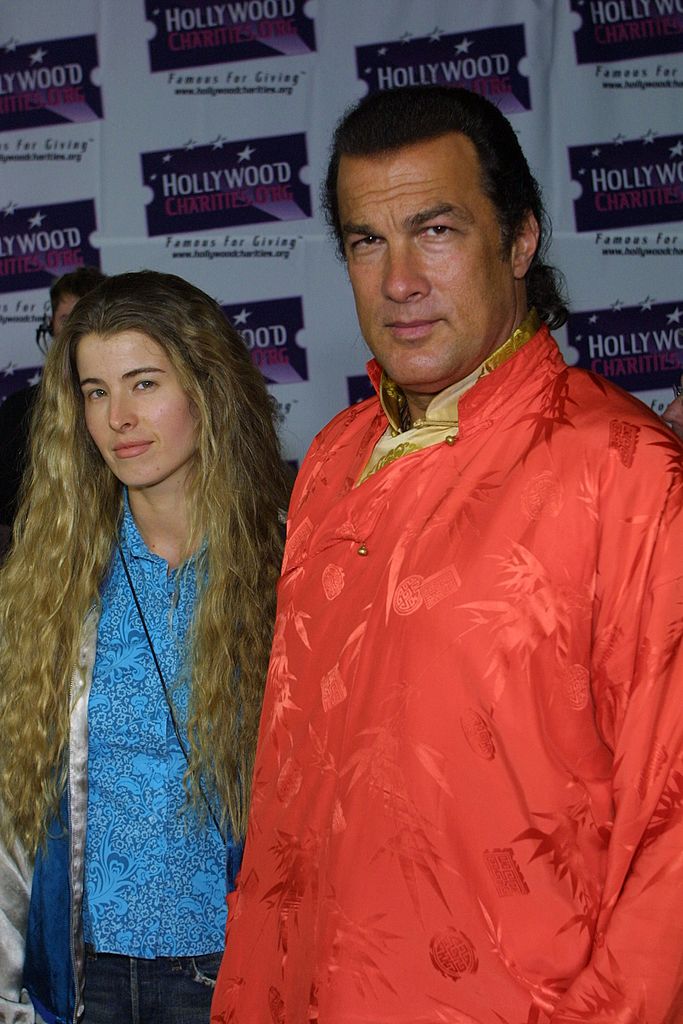 Steven Seagal and wife Adrienne La Russa arriving at the Hard Rock Charity Jam for Hollywoodcharities.org on August 29, 2001 in Universal City, California. / Source: Getty Images