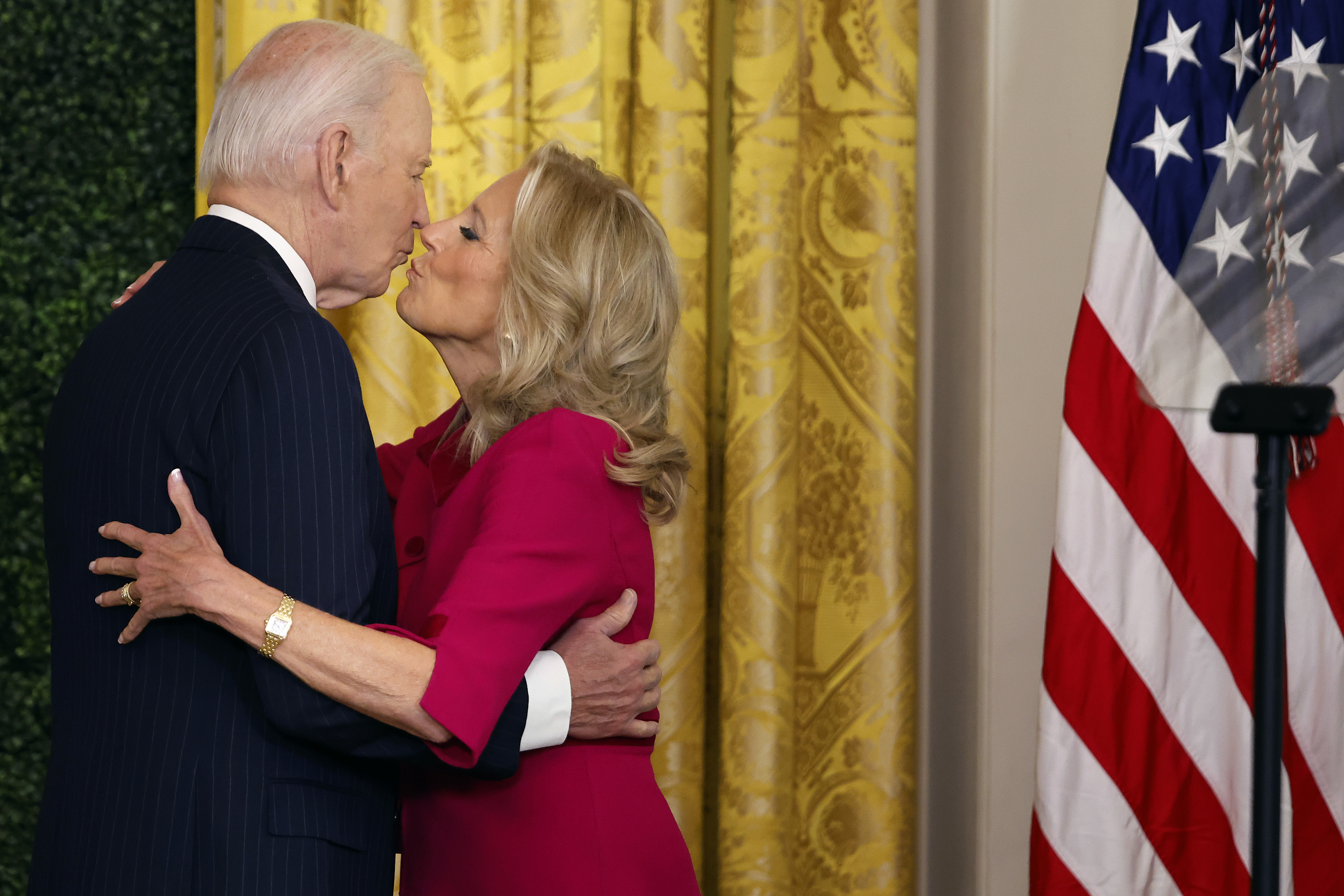 Joe and Jill Biden sharing a kiss during the Classroom to Career Summit in the East Room of the White House on November 13, 2024, in Washington, D.C. | Source: Getty Images