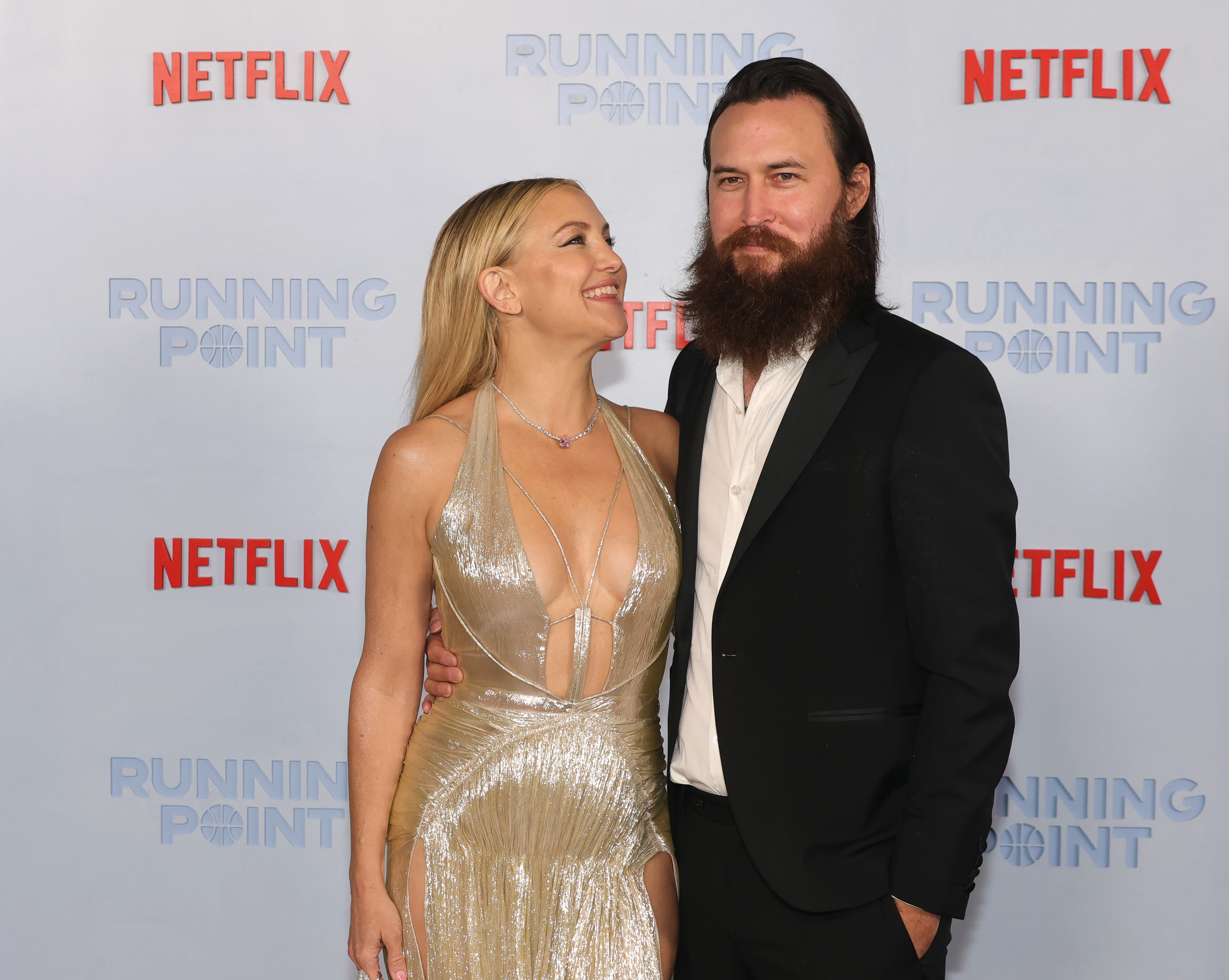 Kate Hudson and Danny Fujikawa at Netflix's "Running Point" premiere at The Egyptian Theatre on February 13, 2025, in Los Angeles, California | Source: Getty Images